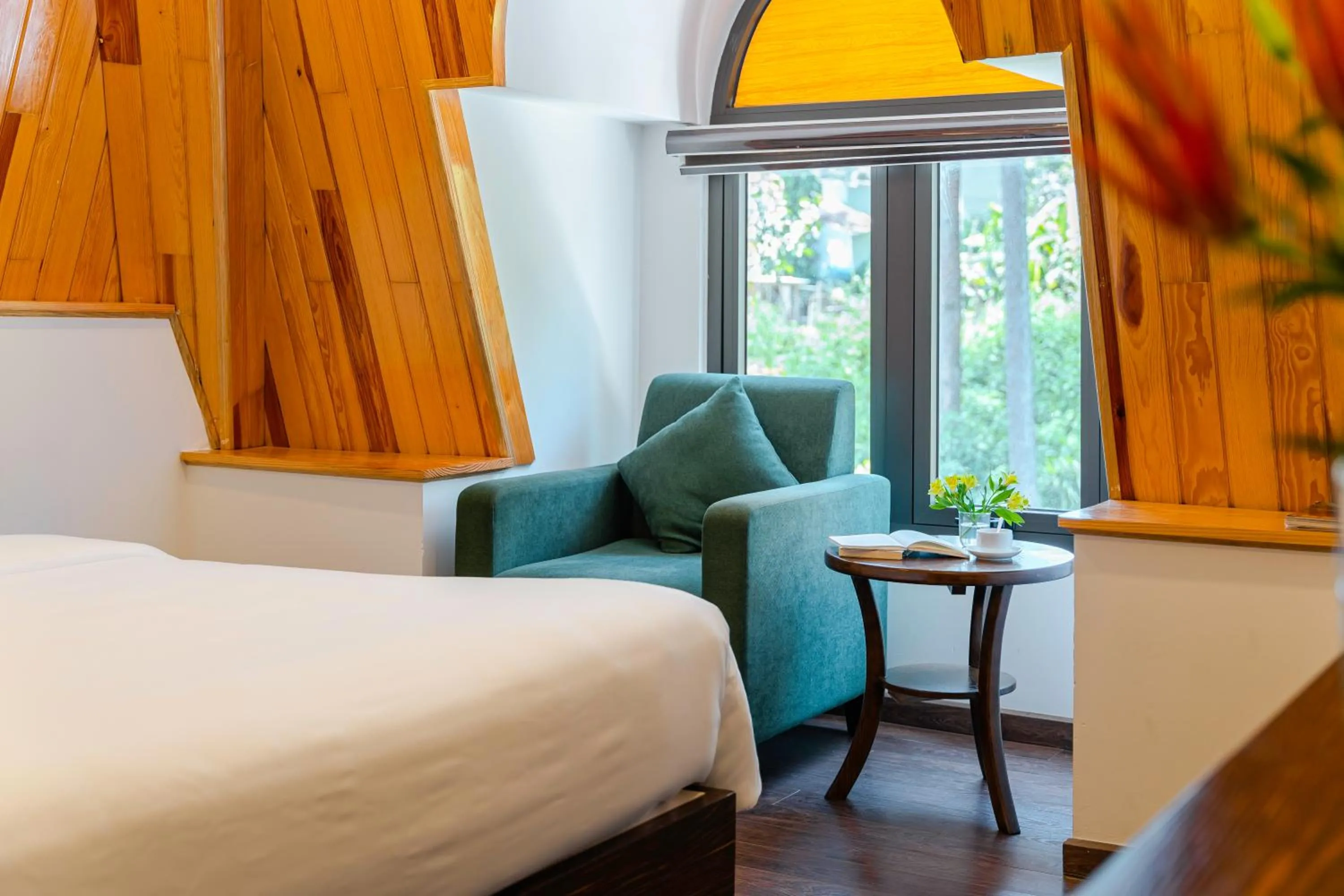 Bed in TTR Moonstone Apart Hotel