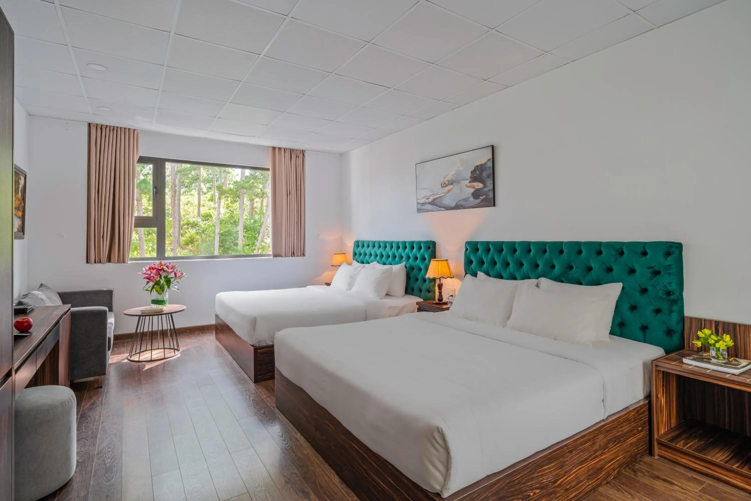 Bed in TTR Moonstone Apart Hotel