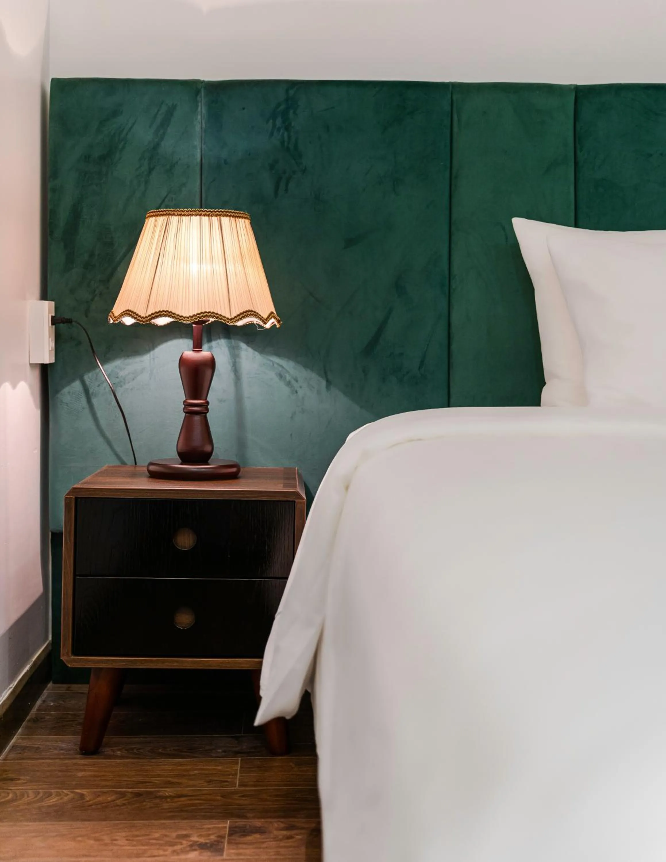 Bed in TTR Moonstone Apart Hotel