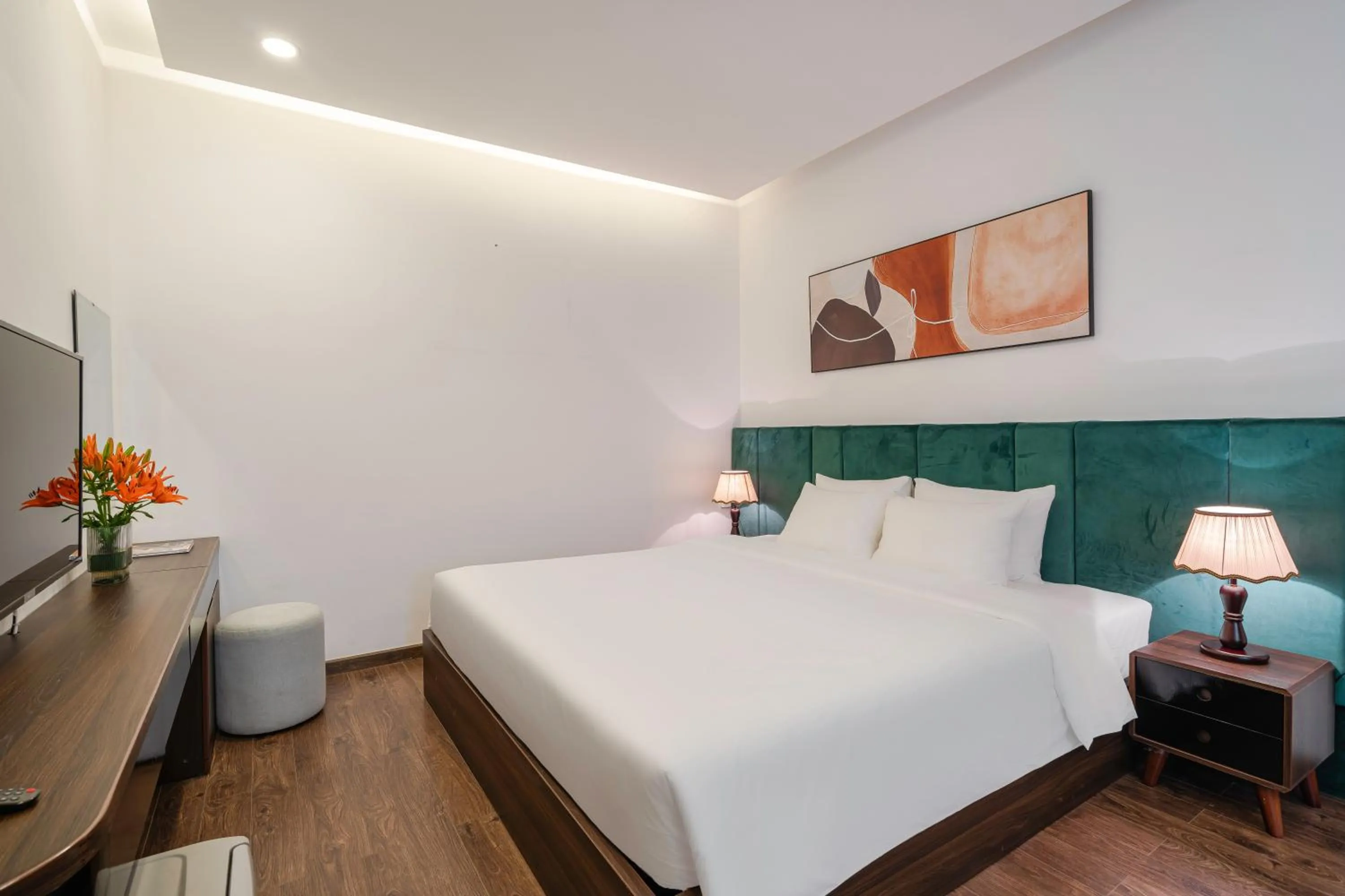 Bed in TTR Moonstone Apart Hotel