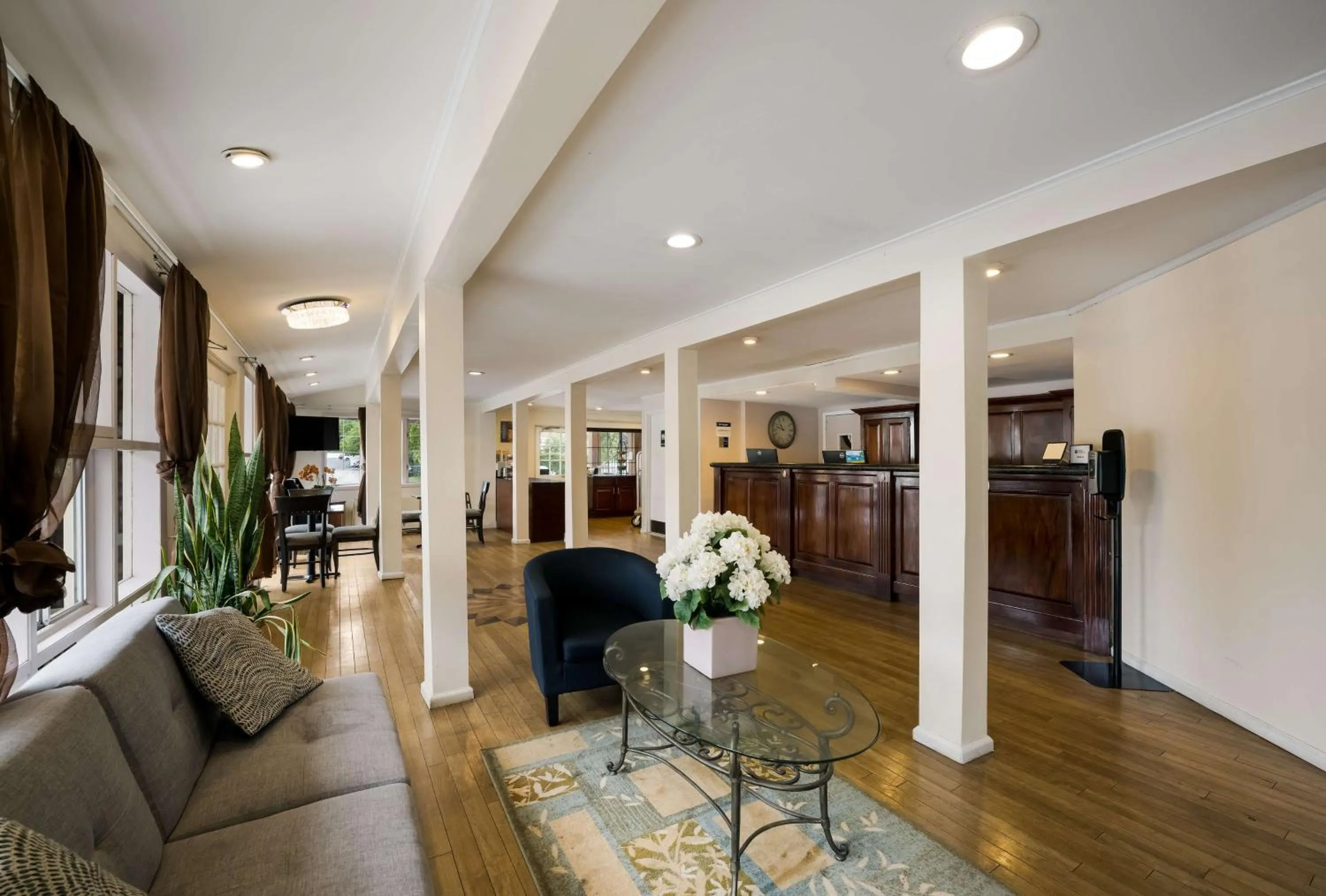Lobby or reception in SureStay Plus by Best Western Woodbury Inn