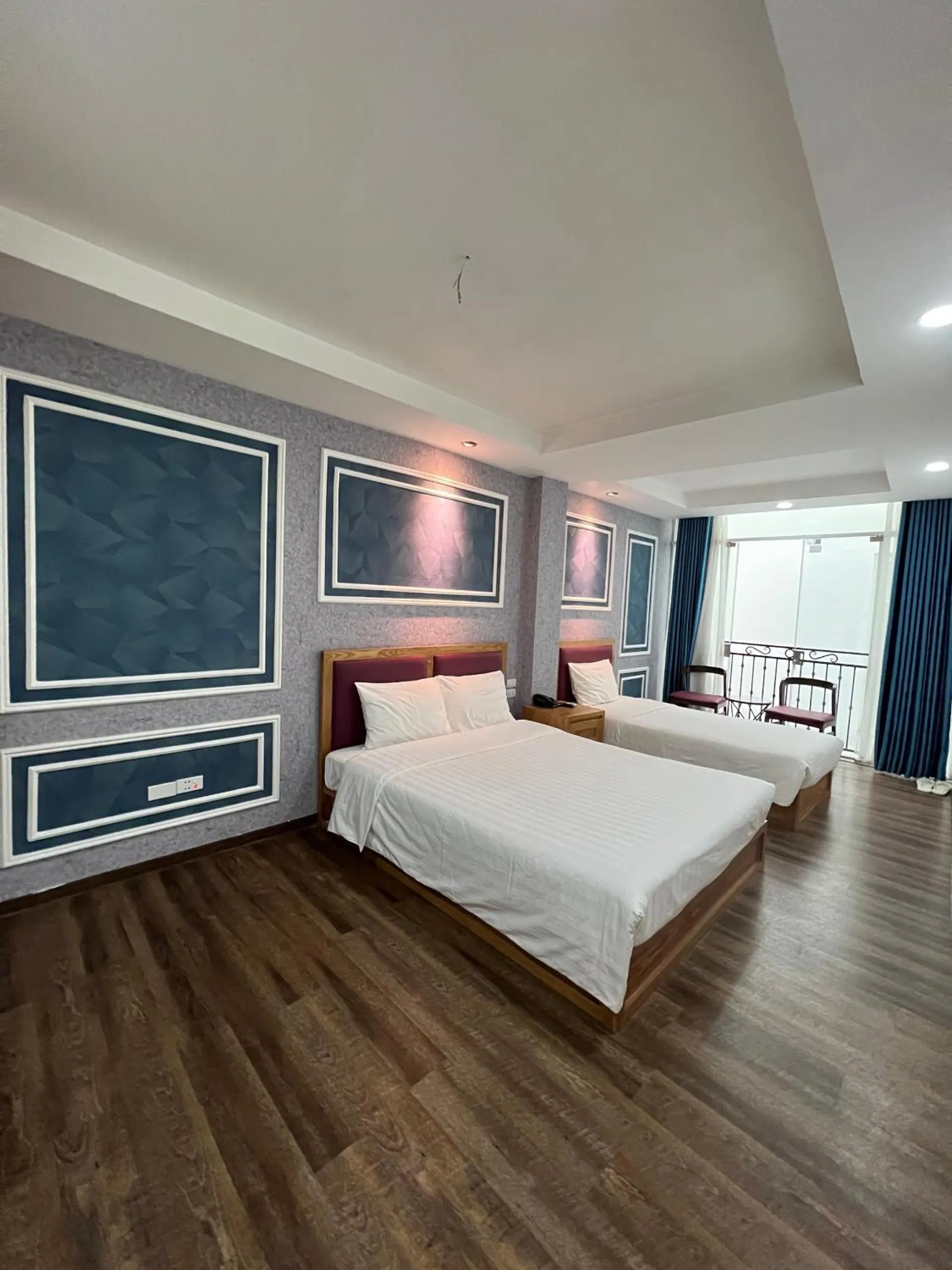 Photo of the whole room, Bed in Holiday Suites Hotel & Spa
