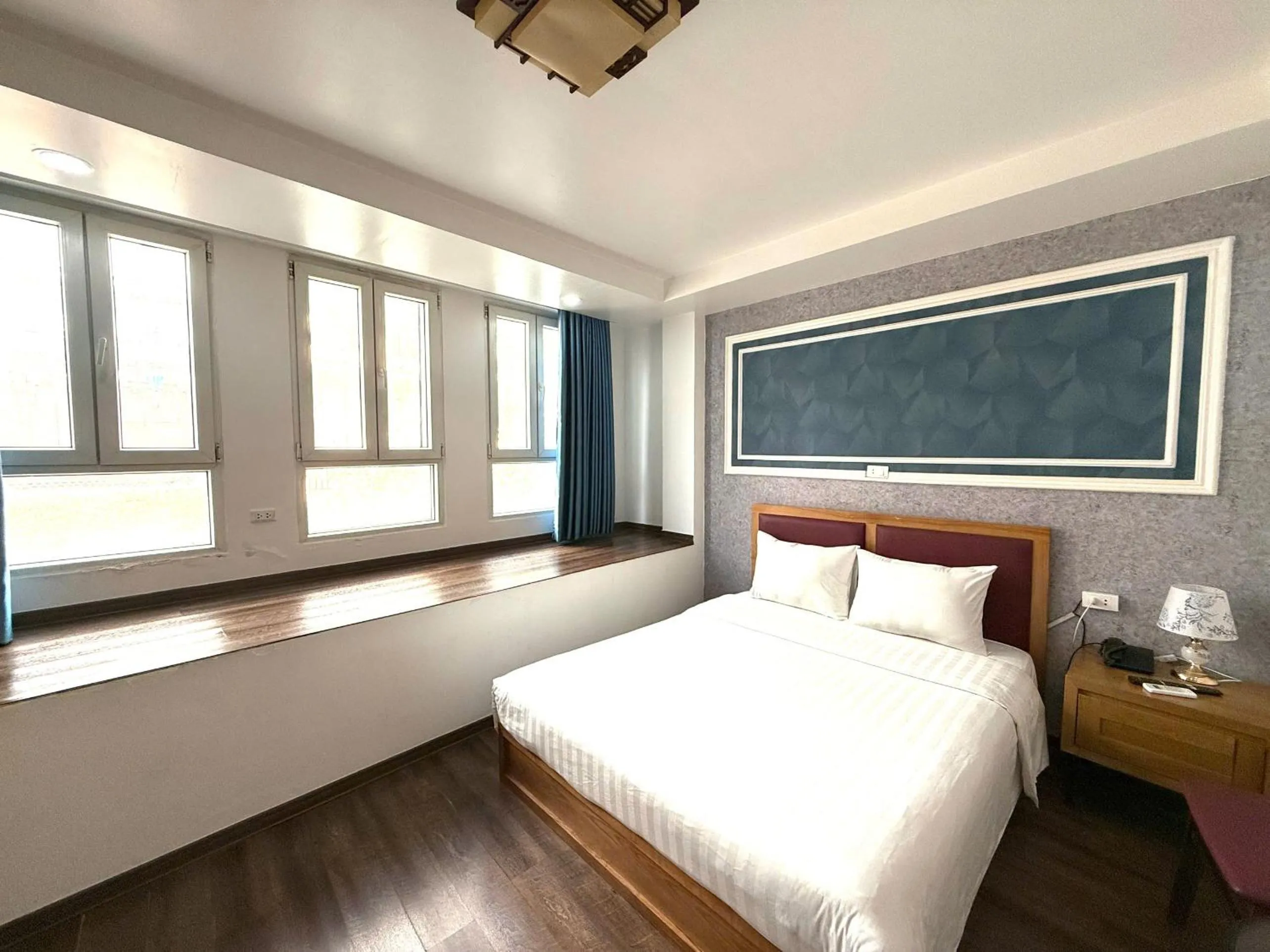 Bed in Holiday Suites Hotel & Spa