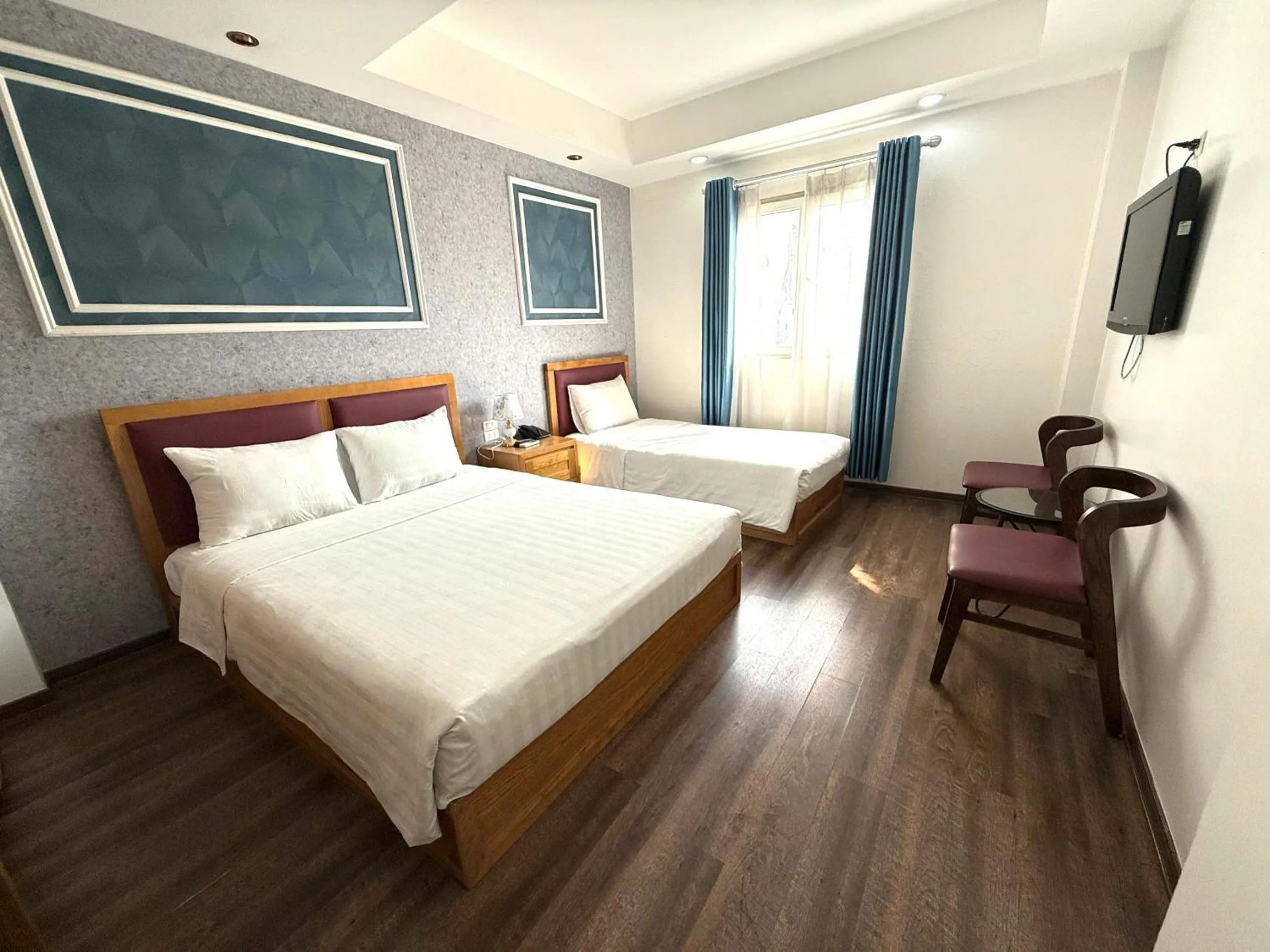 Bed in Holiday Suites Hotel & Spa