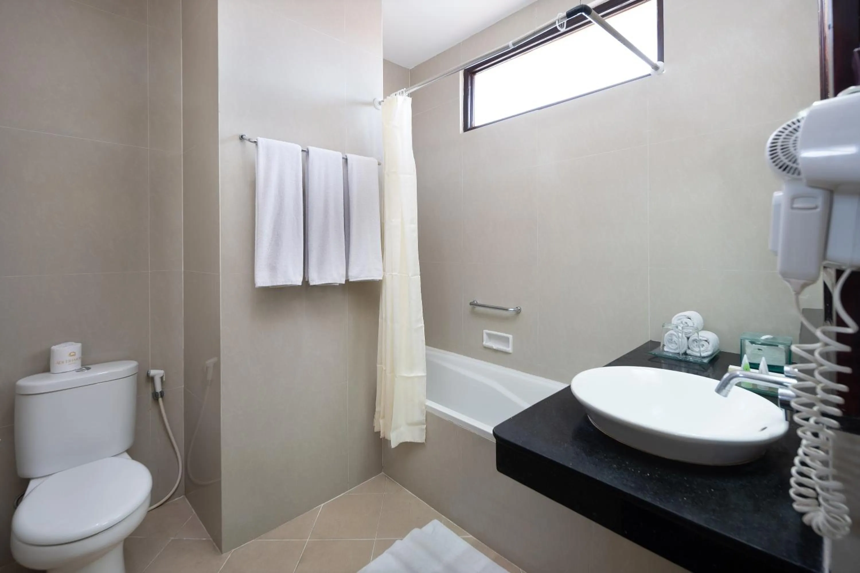 Bathroom in Adi Dharma Hotel Kuta
