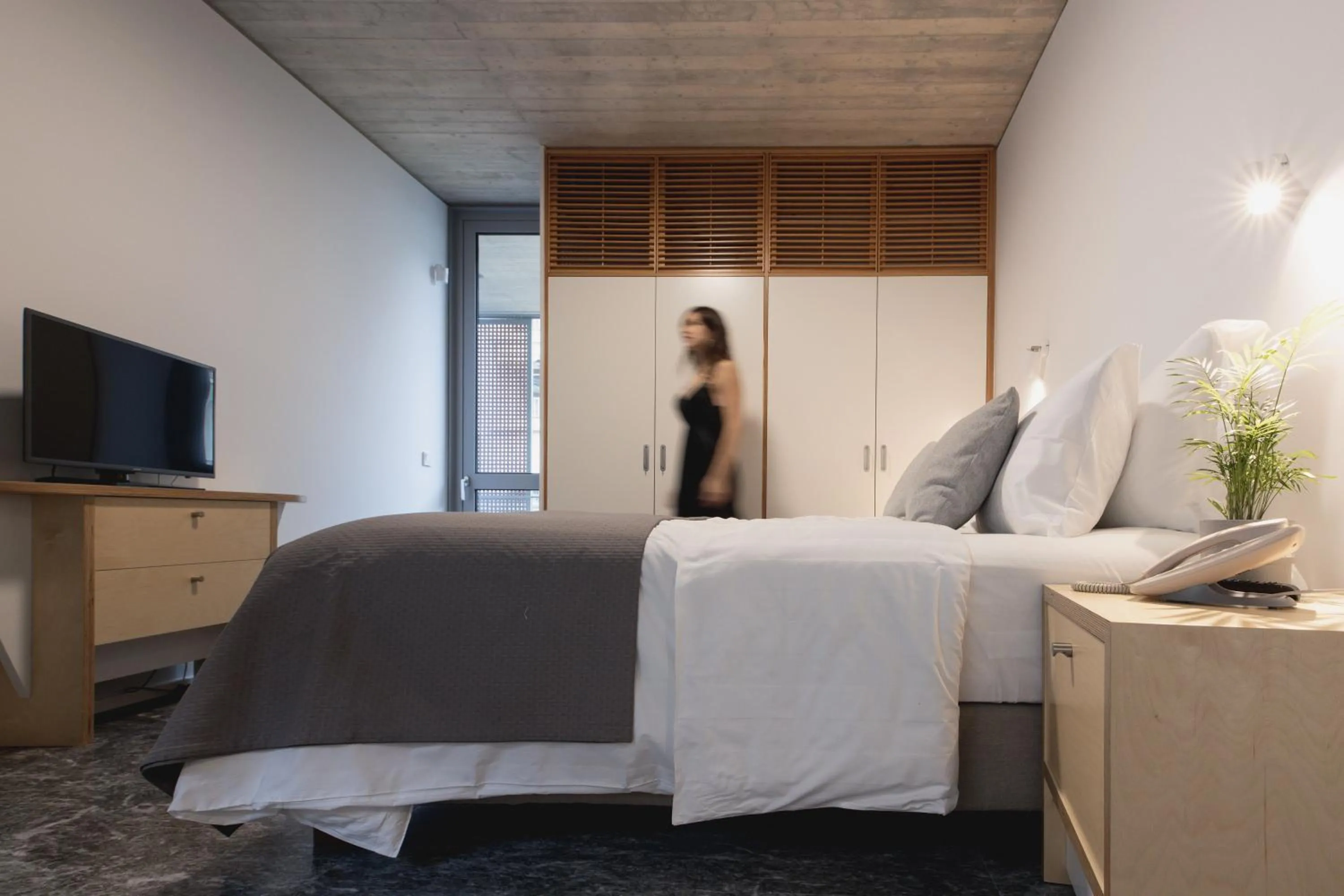 Photo of the whole room, Bed in Athens BlueBuilding