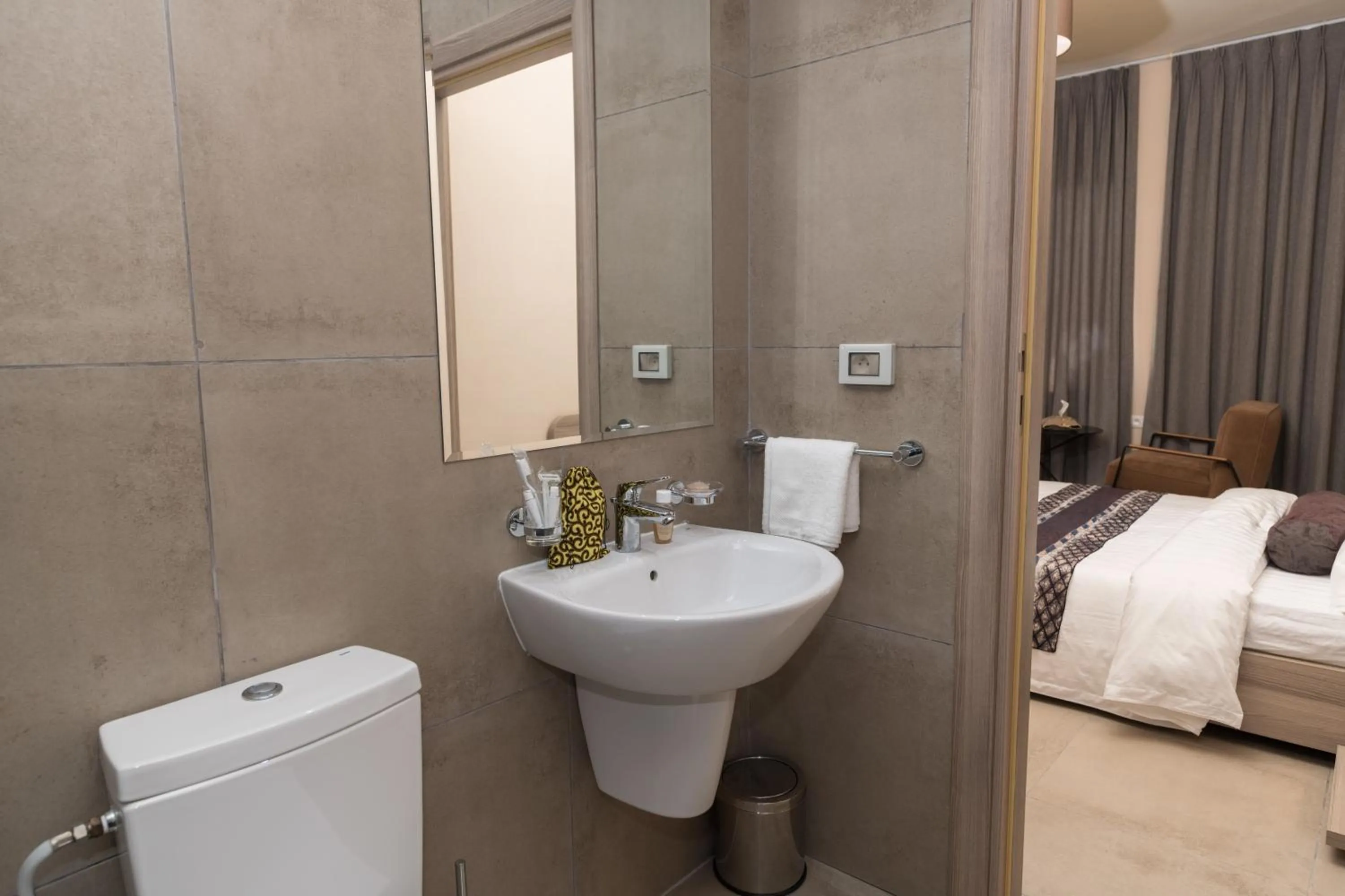 Bed in Roots Hotel Apartments Abidjan