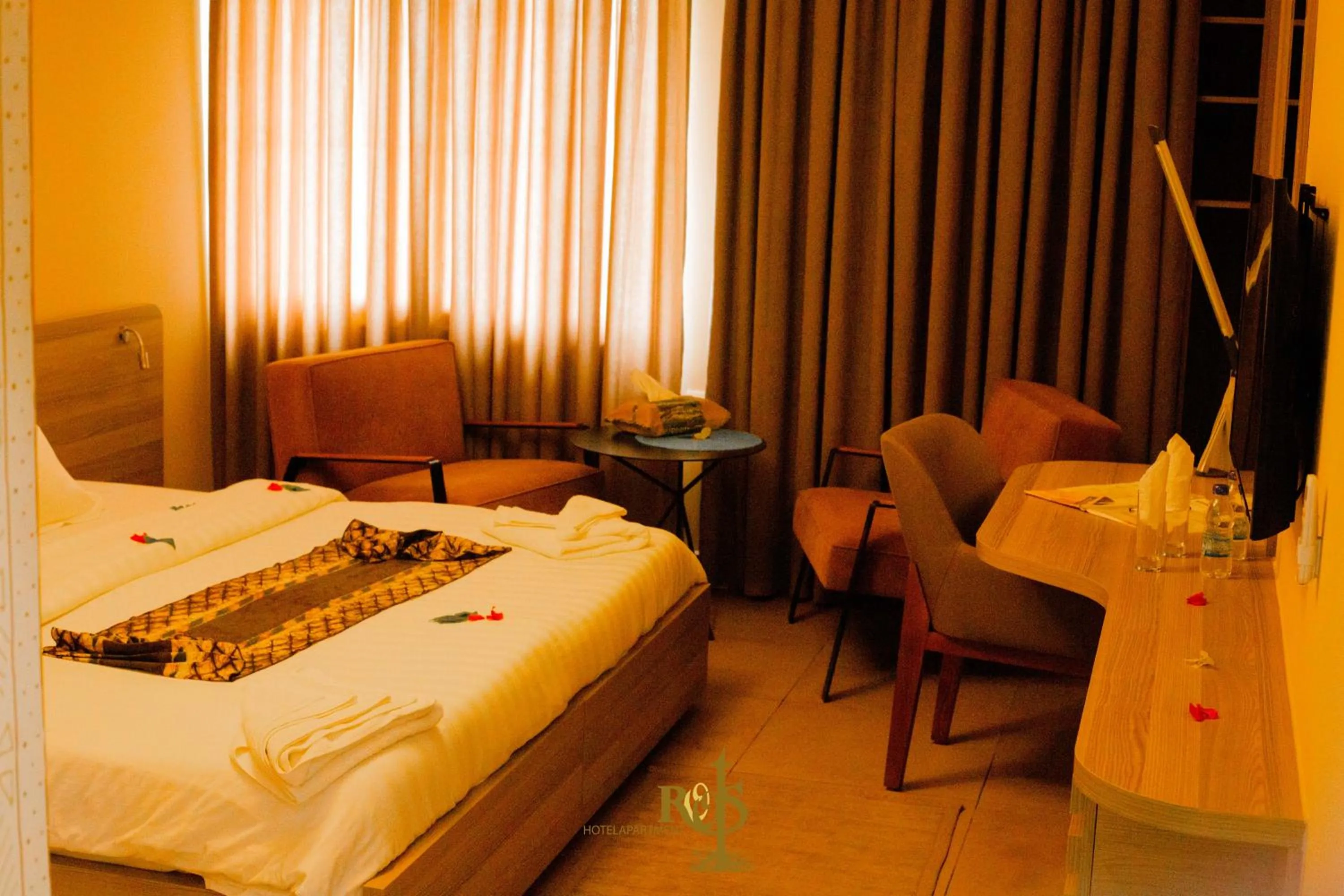 Photo of the whole room, Bed in Roots Hotel Apartments Abidjan