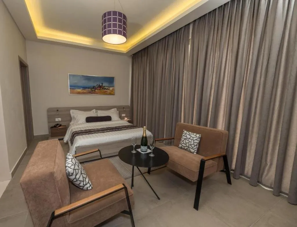 Bed in Roots Hotel Apartments Abidjan