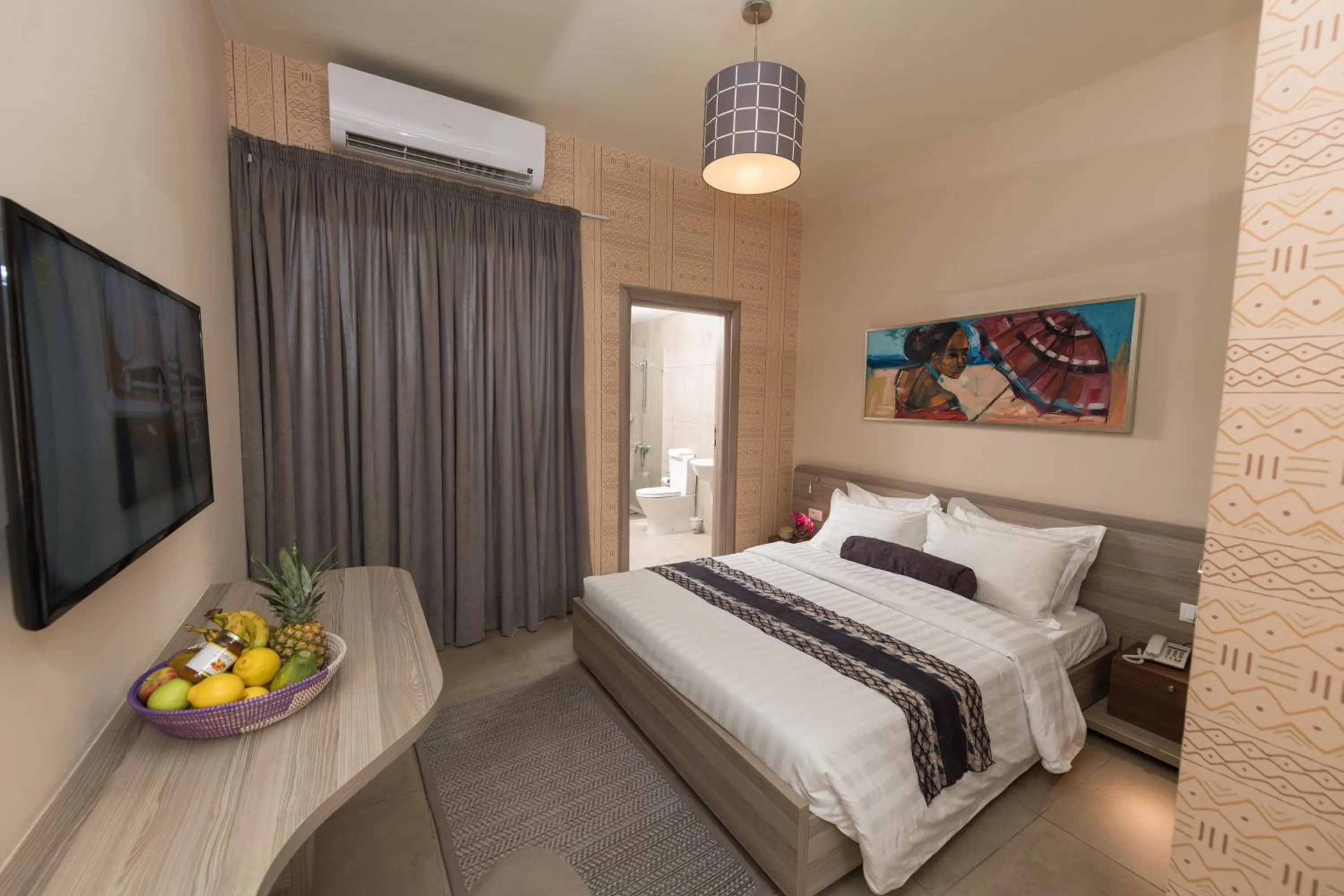 Bed in Roots Hotel Apartments Abidjan