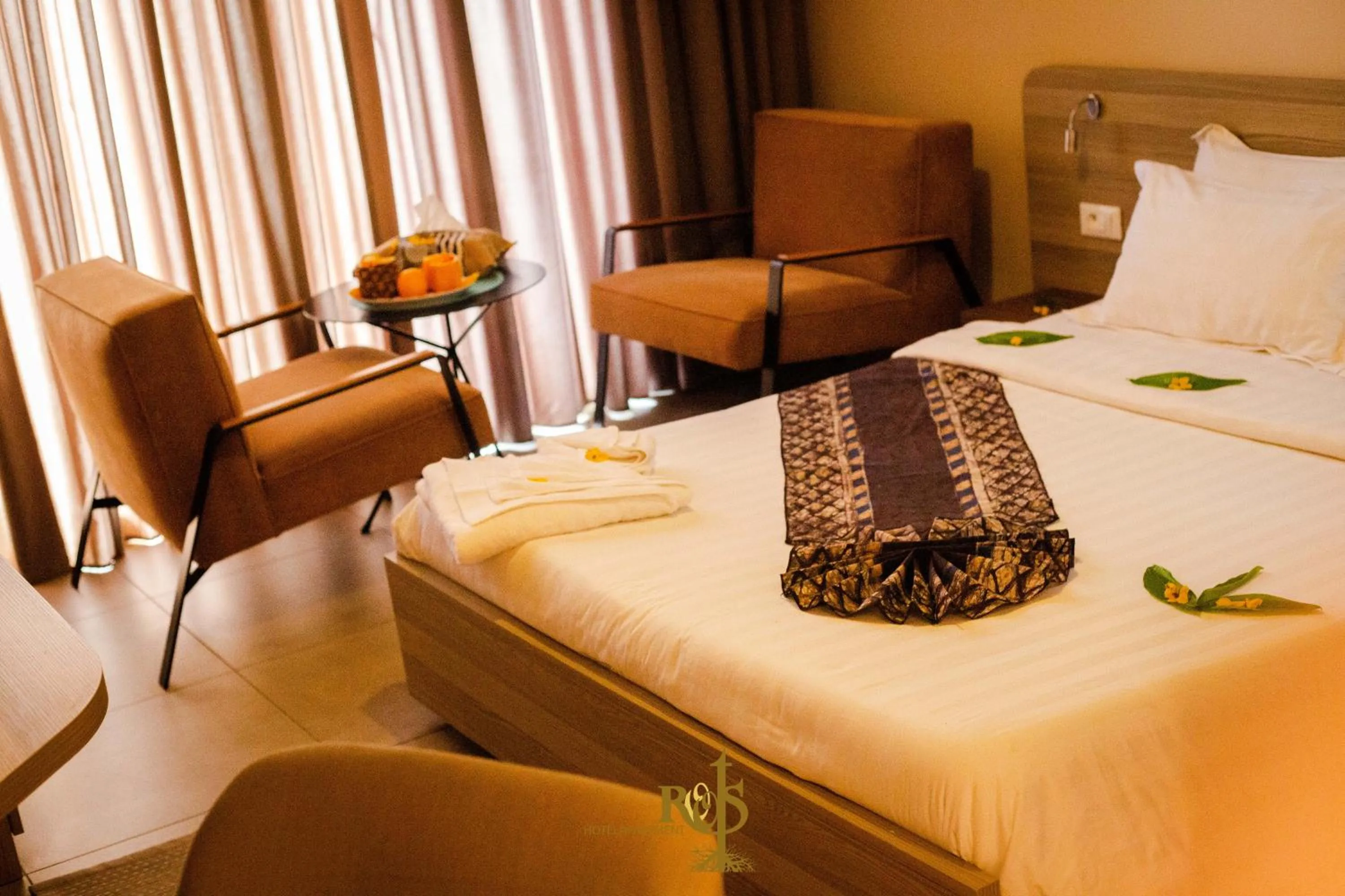 Bed in Roots Hotel Apartments Abidjan