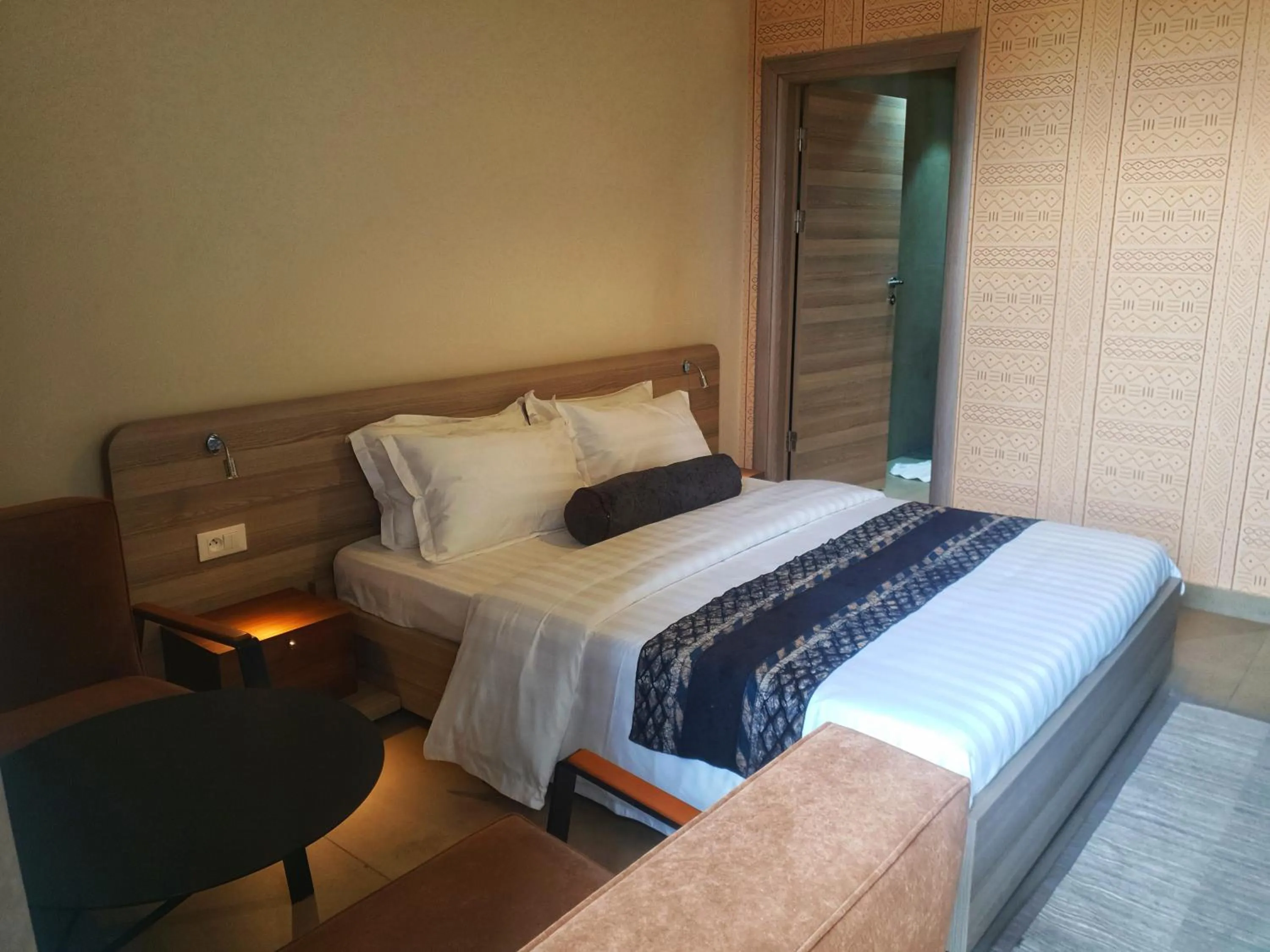 Bed in Roots Hotel Apartments Abidjan