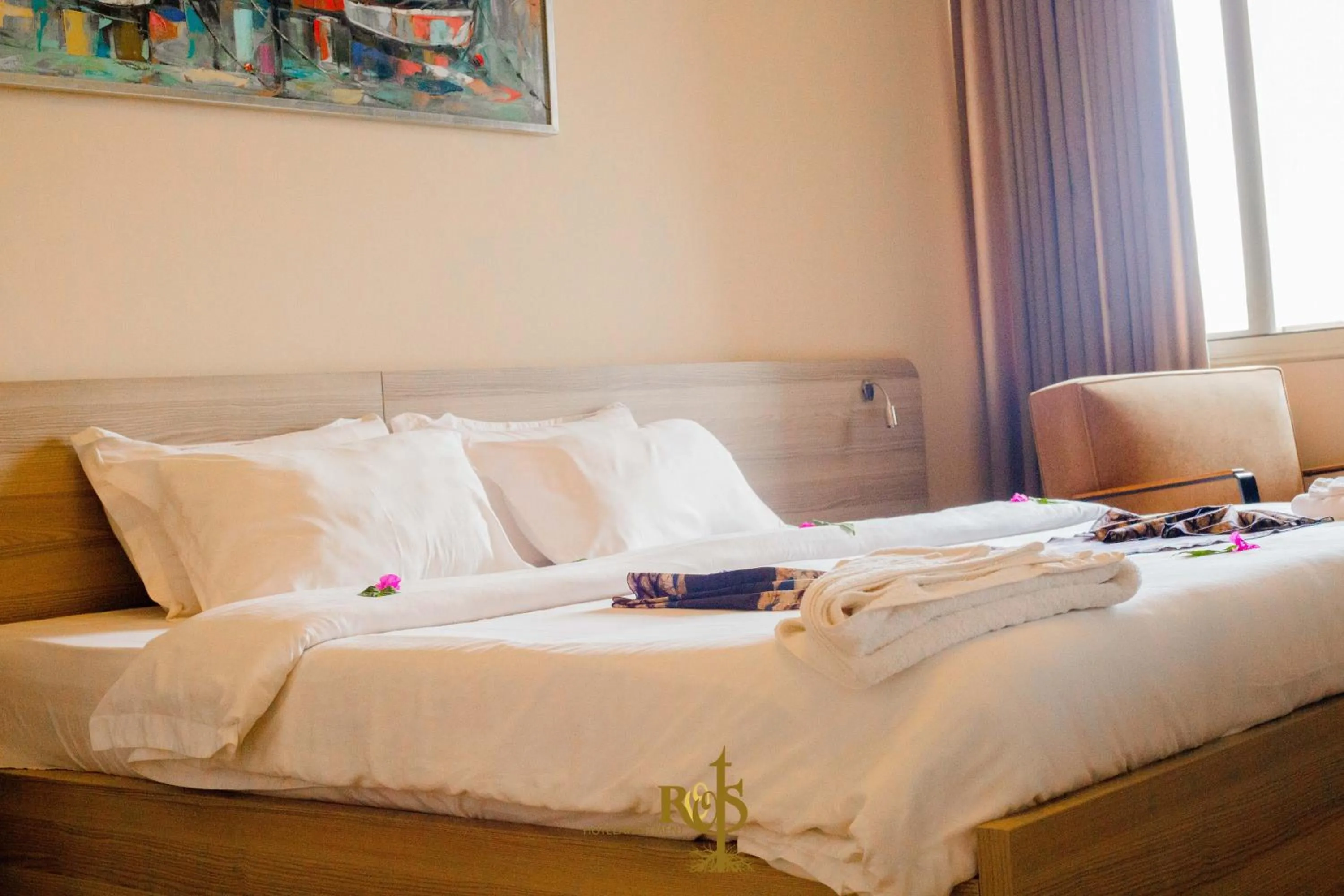 Bed in Roots Hotel Apartments Abidjan