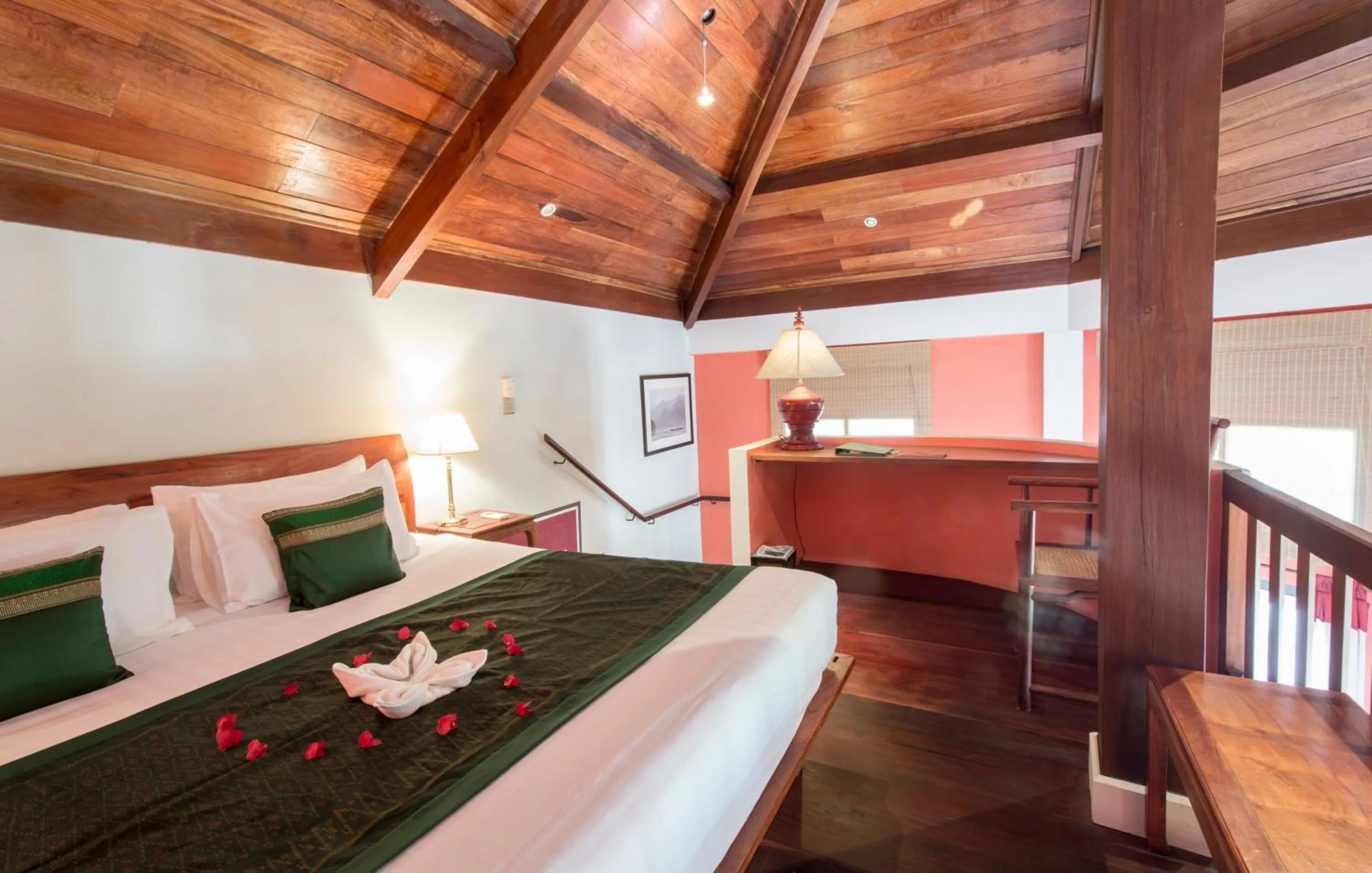 Bed in The Belle Rive Boutique Hotel