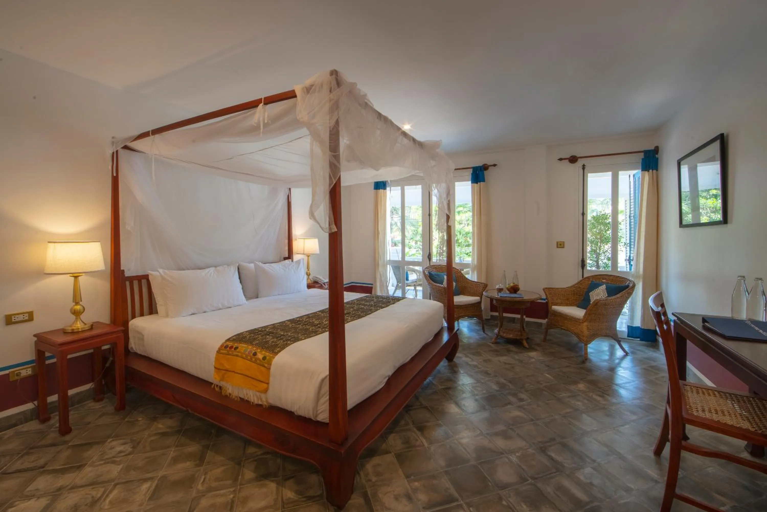 Bed in The Belle Rive Boutique Hotel
