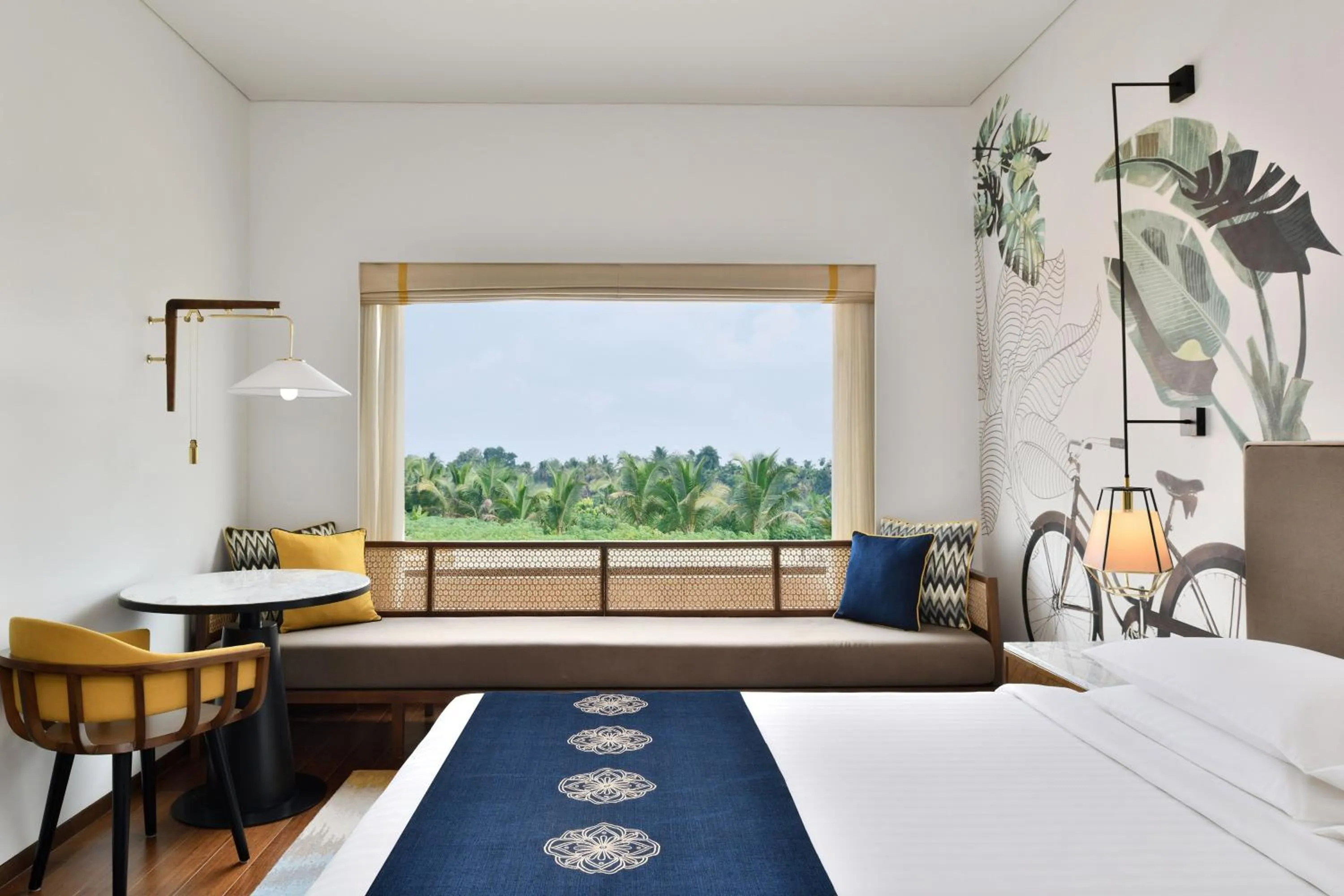 Photo of the whole room, Bed in Port Muziris, A Tribute Portfolio Hotel, Kochi Airport