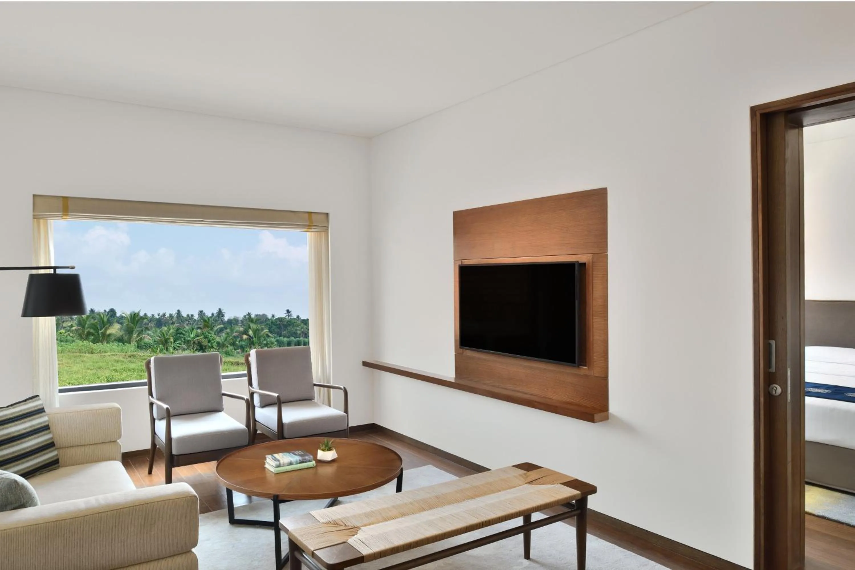 Living room in Port Muziris, A Tribute Portfolio Hotel, Kochi Airport