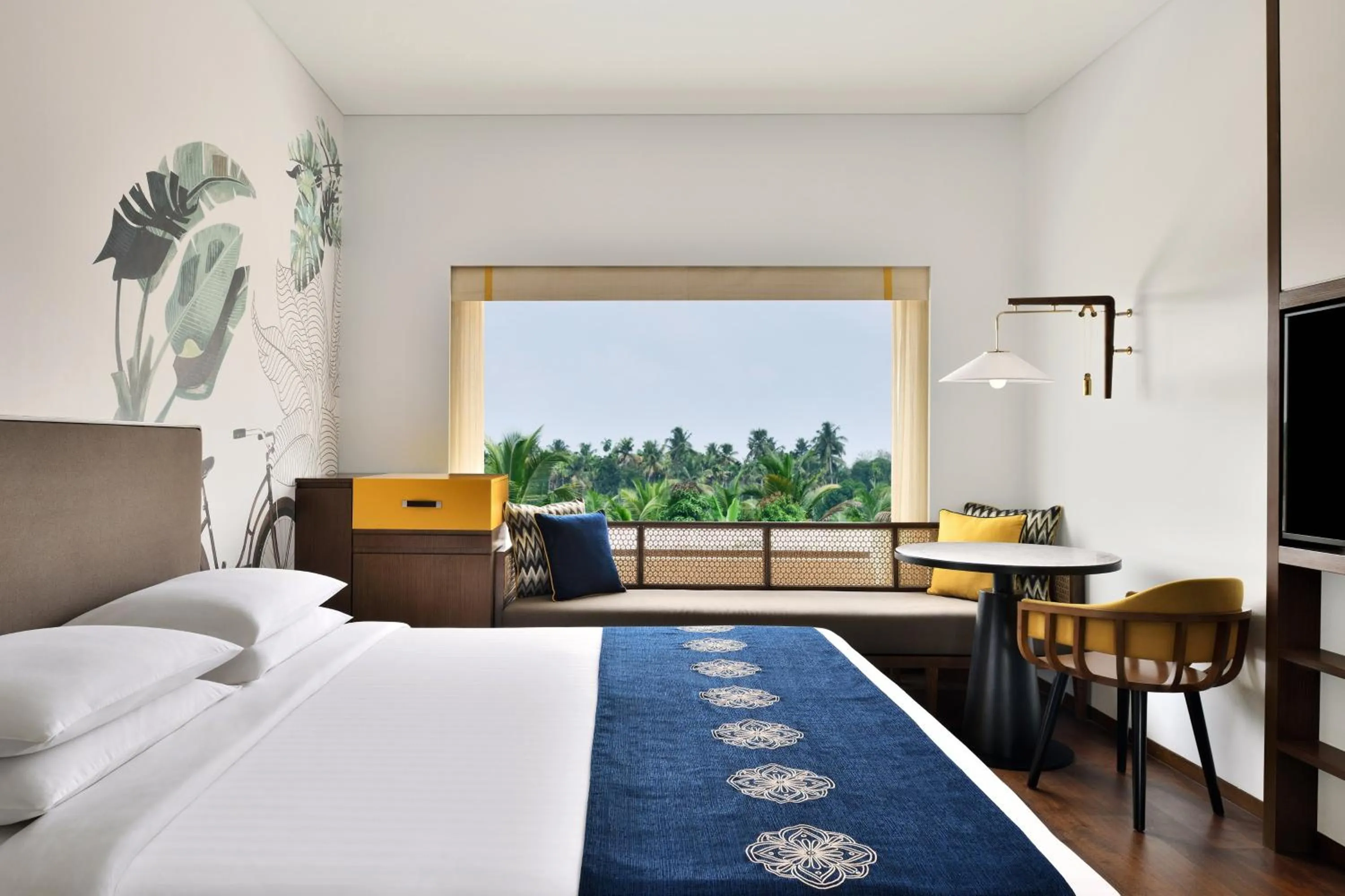 Photo of the whole room, Bed in Port Muziris, A Tribute Portfolio Hotel, Kochi Airport