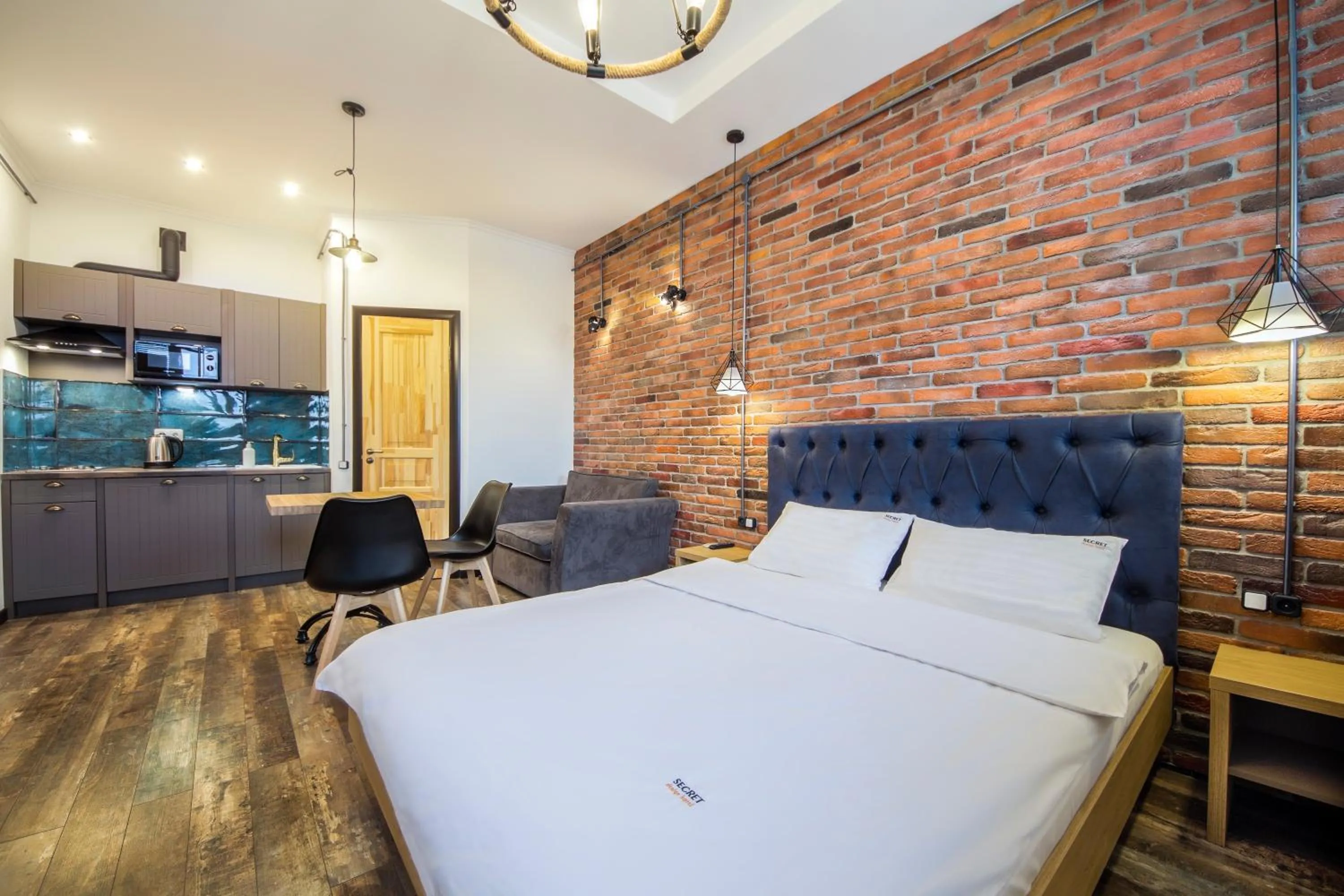 Kitchen or kitchenette, Bed in Secret Apartments