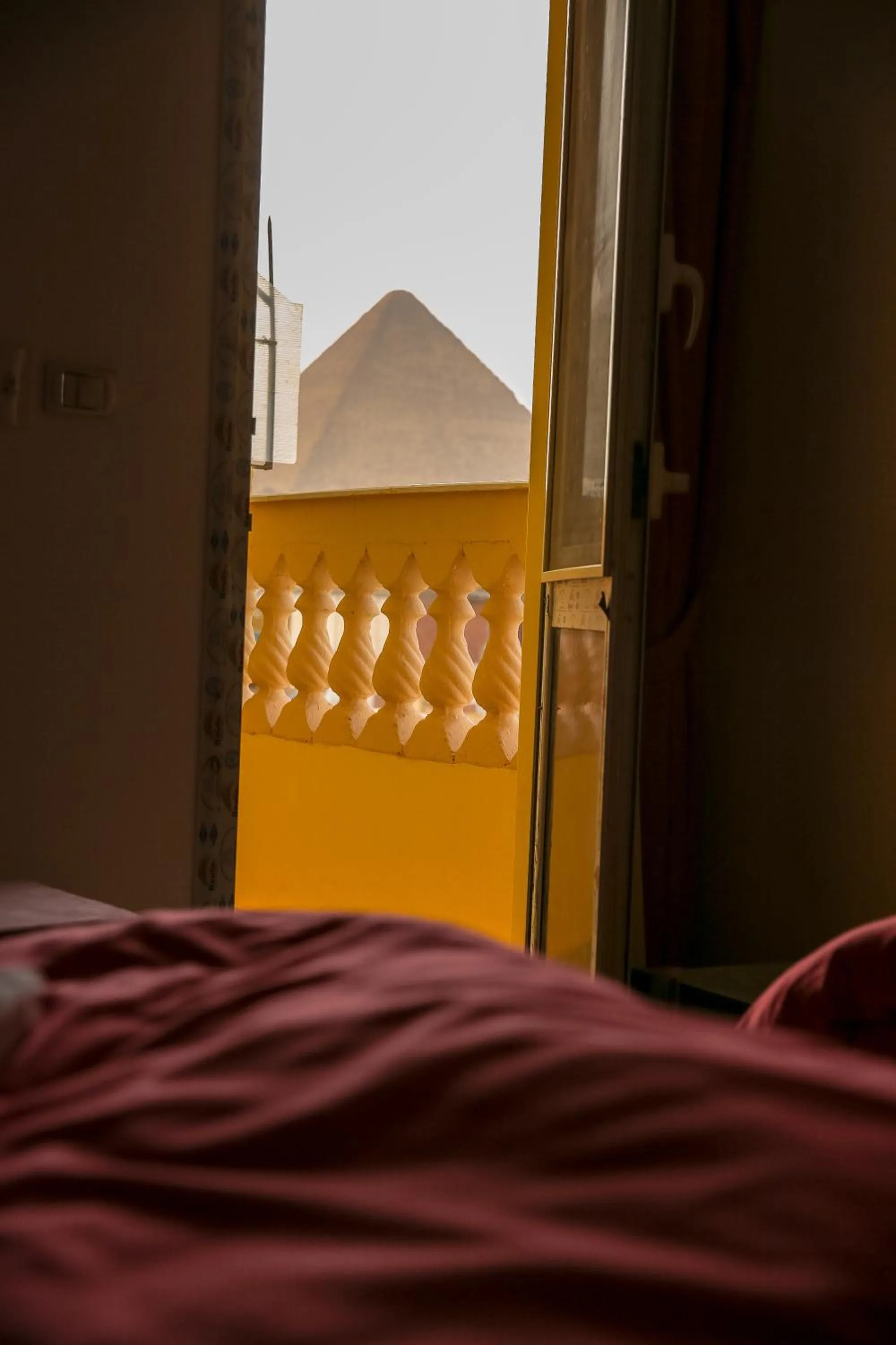 Bed in Queen Pyramids View Inn