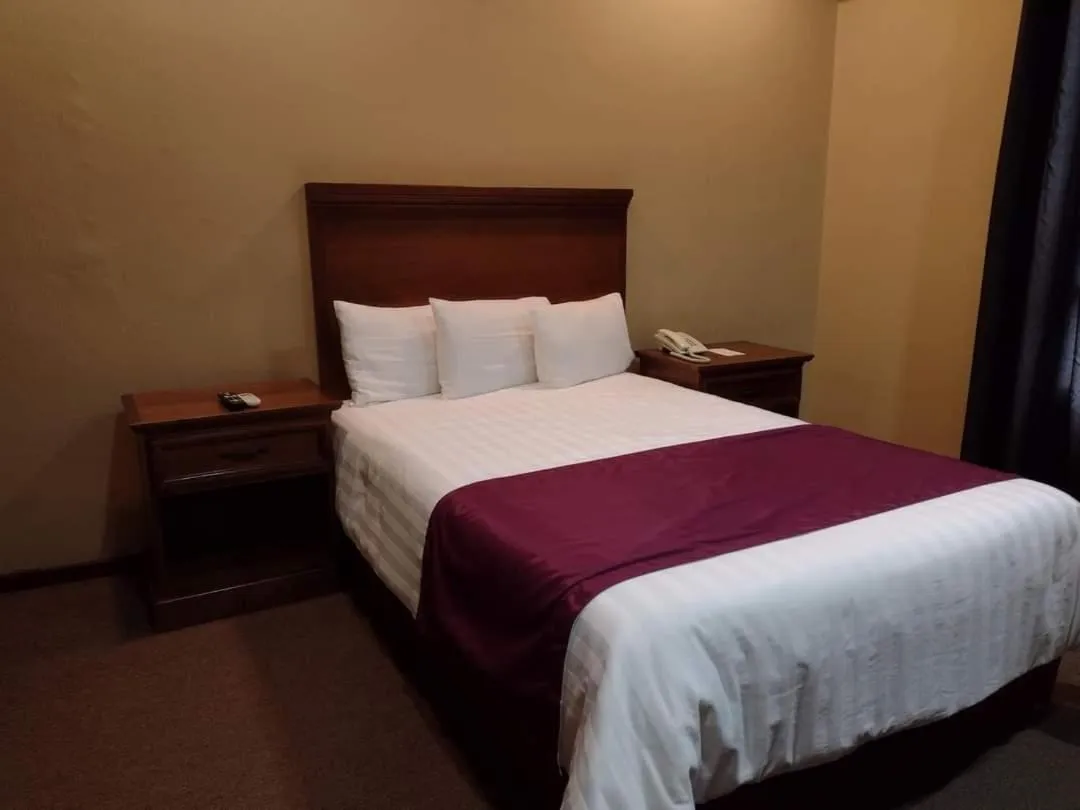 Bed in Hotel Reforma Tuxpan