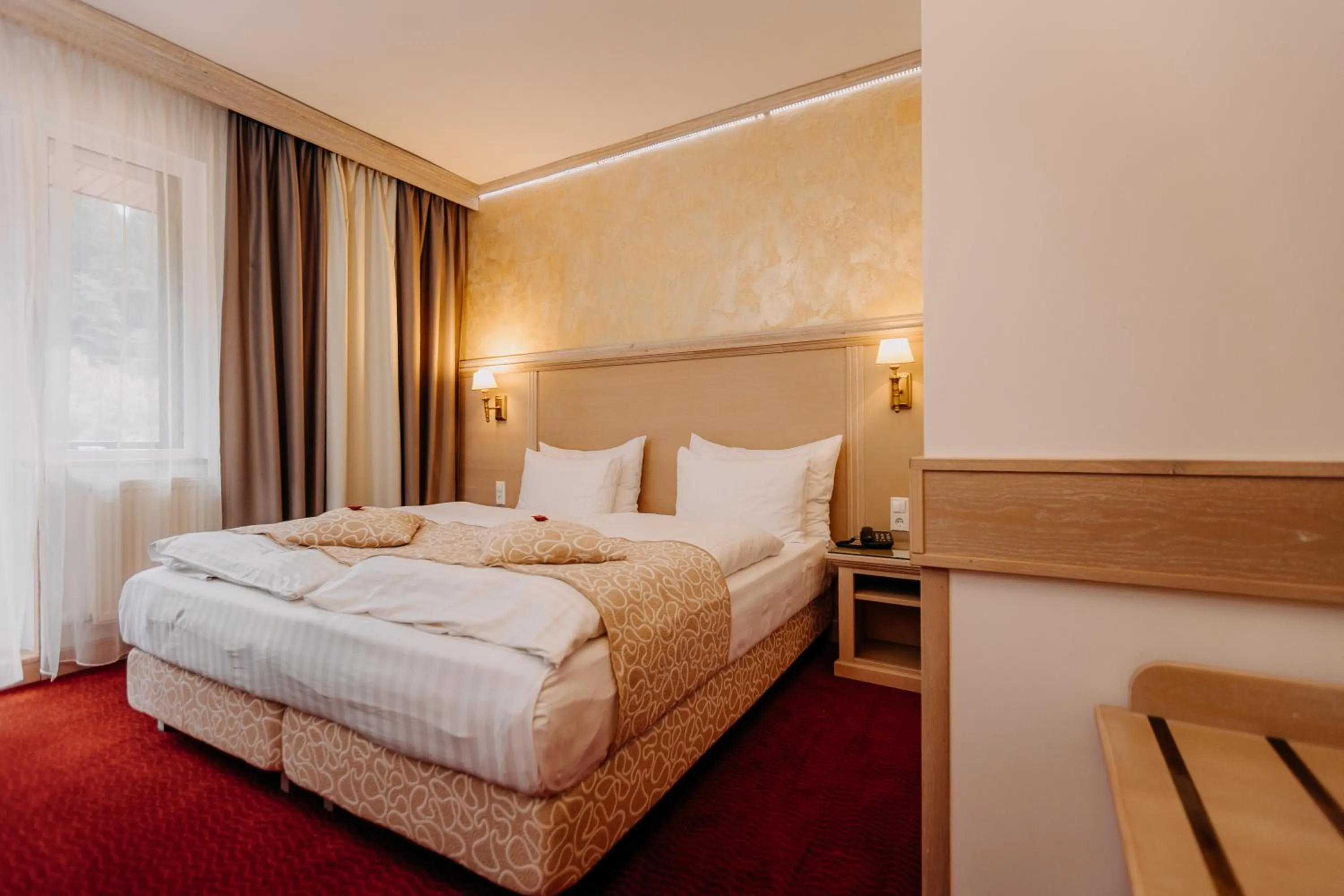 Bed in Hotel Lacu Rosu