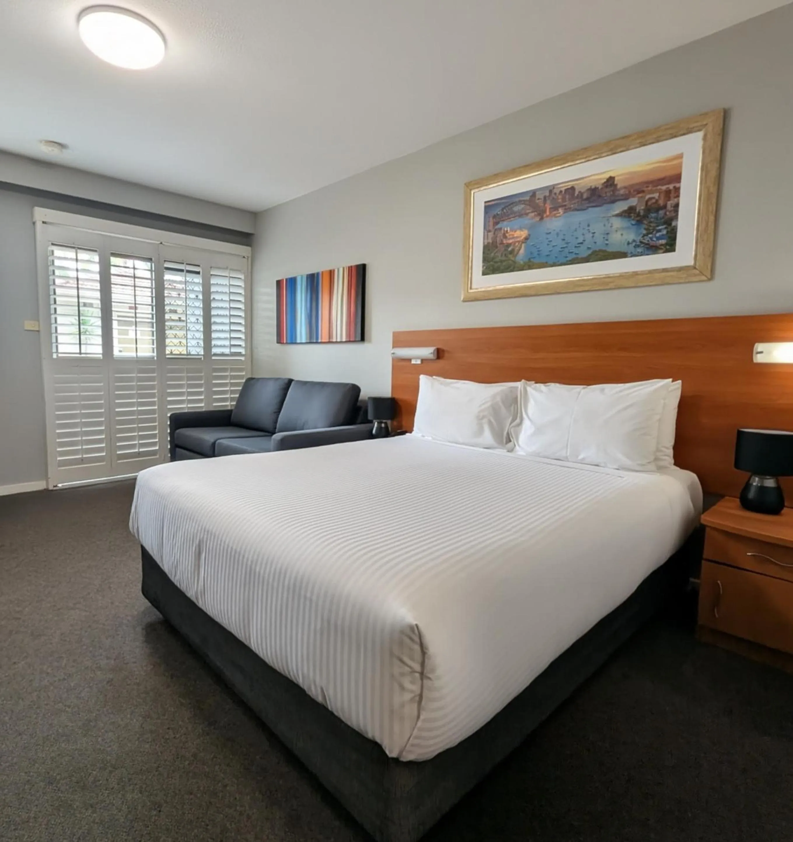 Bed in Ramada Hotel & Suites by Wyndham Cabramatta
