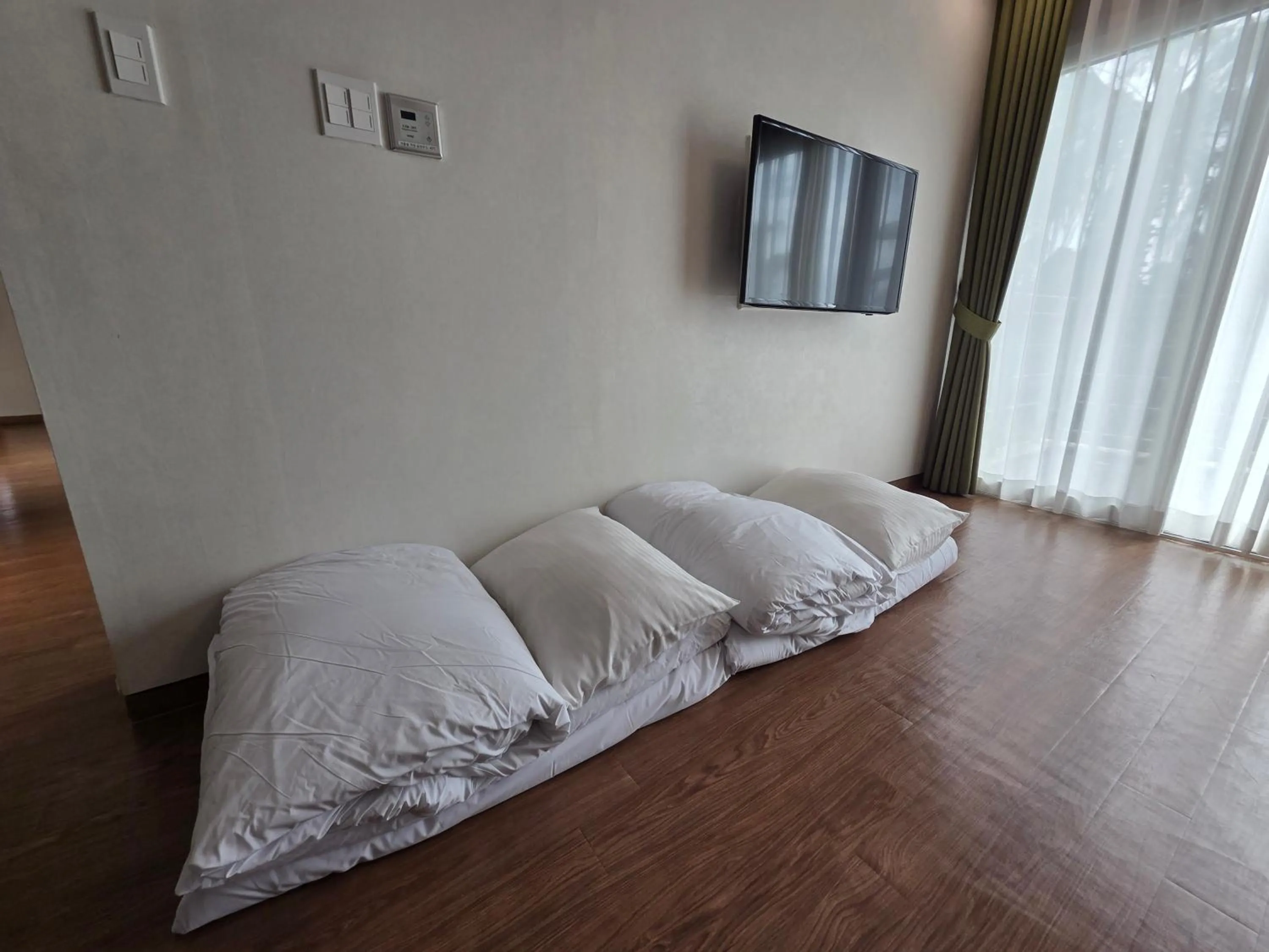 Living room, Bed in Y Resort Jeju