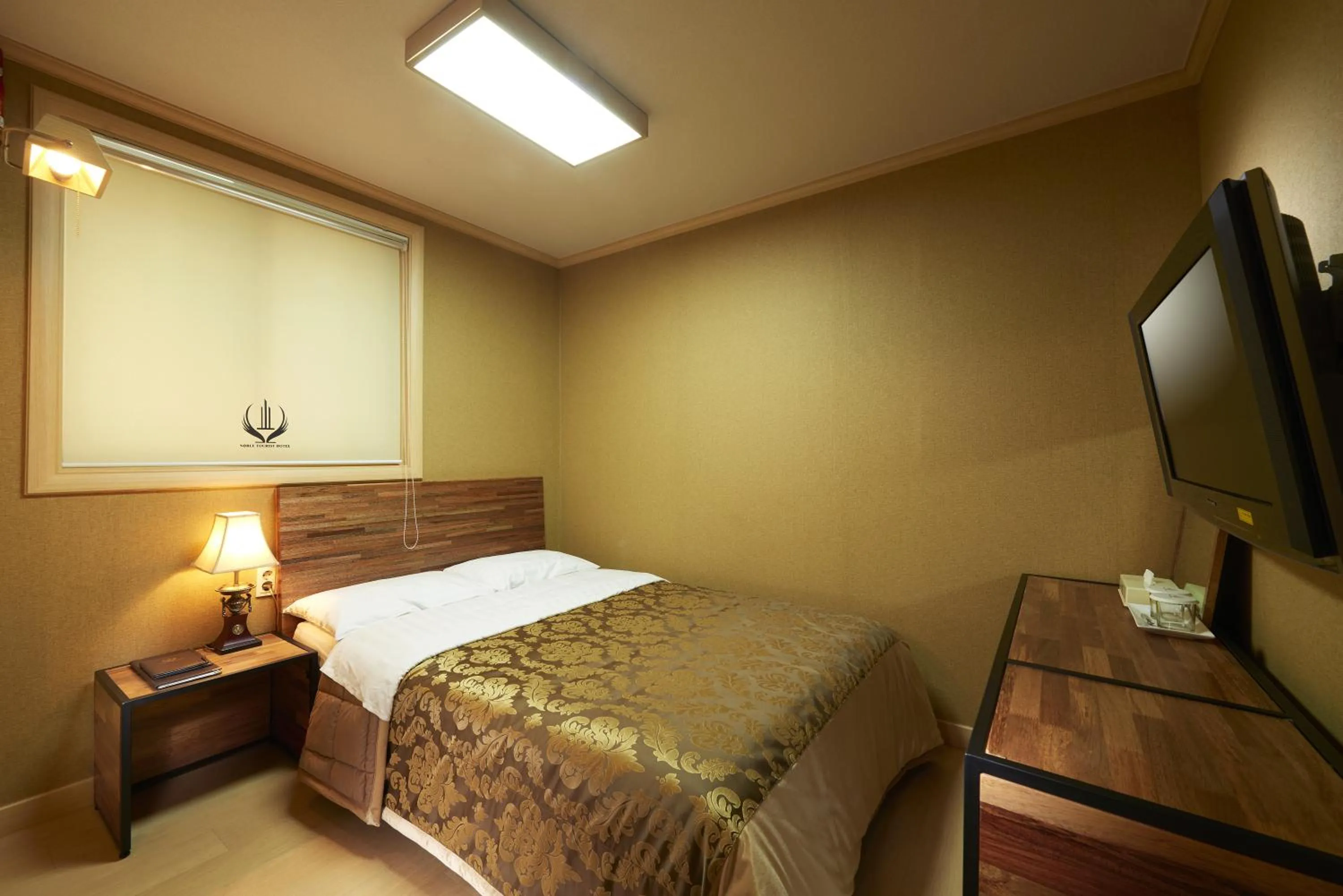 cot, Bed in Noble Hotel