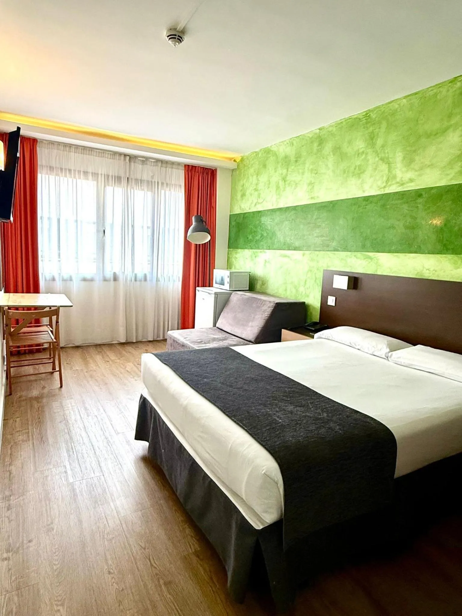 Bed in Apartamentos Recoletos