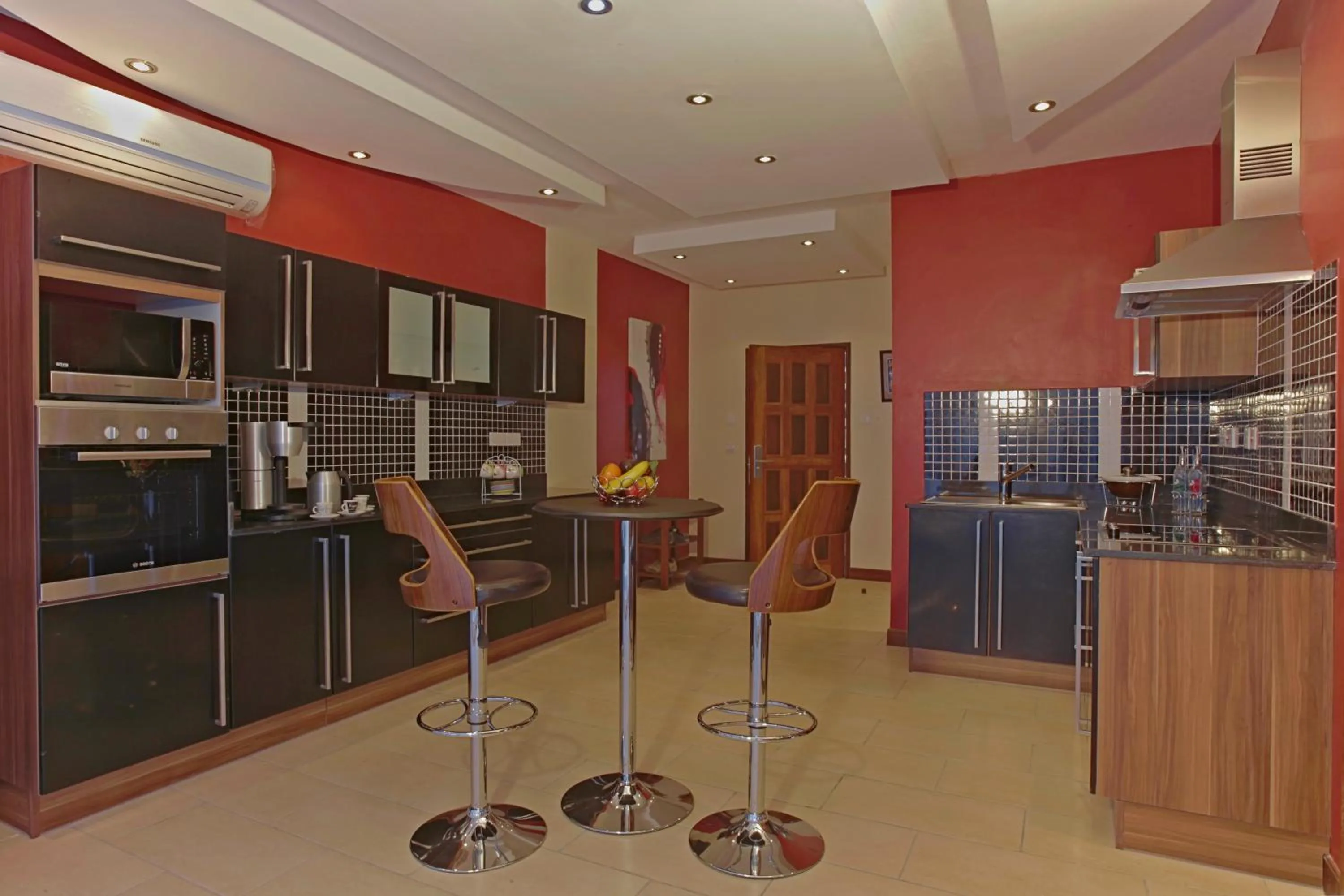 Kitchen or kitchenette in Cowrie Shell Beach Apartments Official