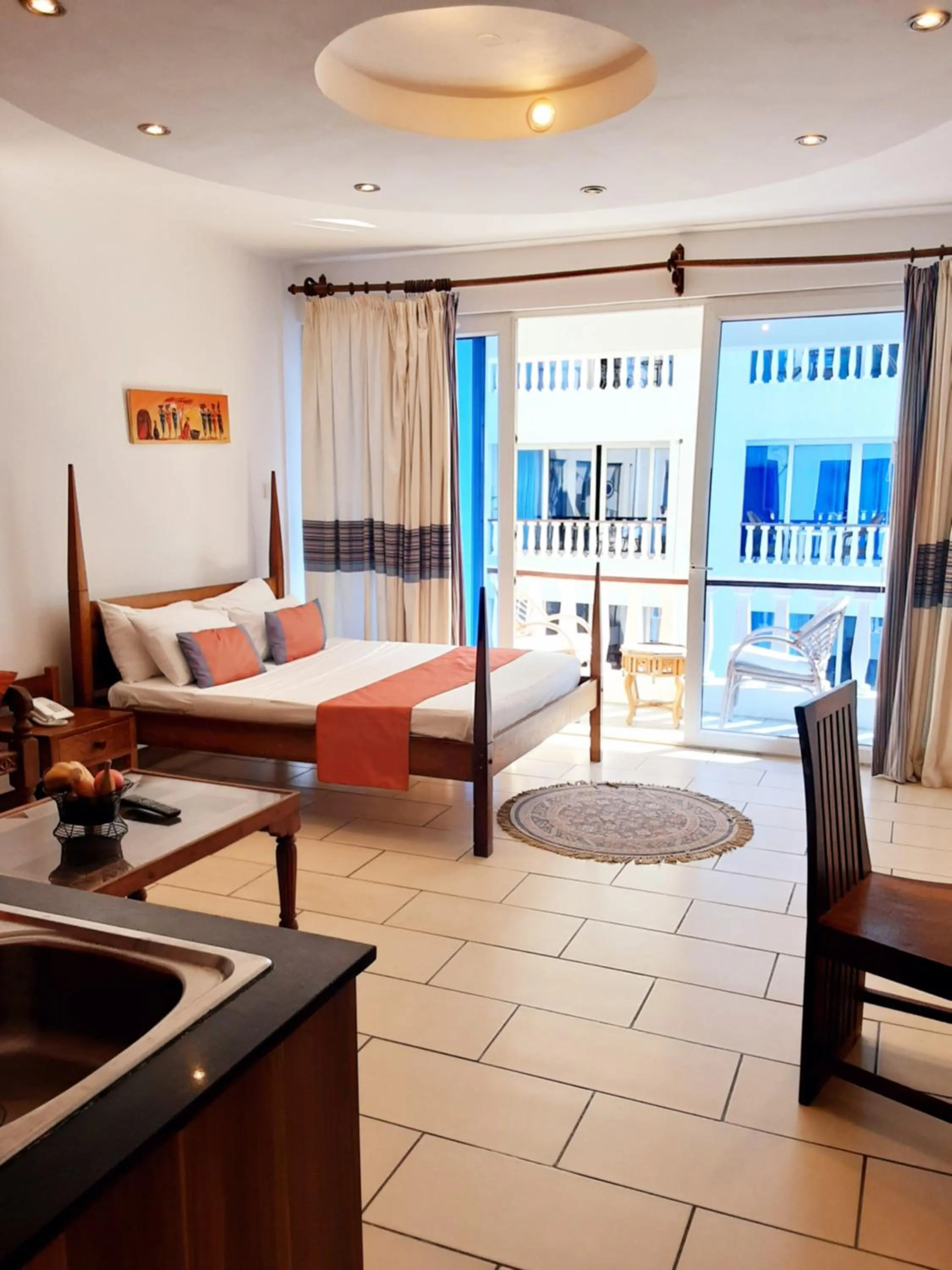 Photo of the whole room, Bed in Cowrie Shell Beach Apartments Official