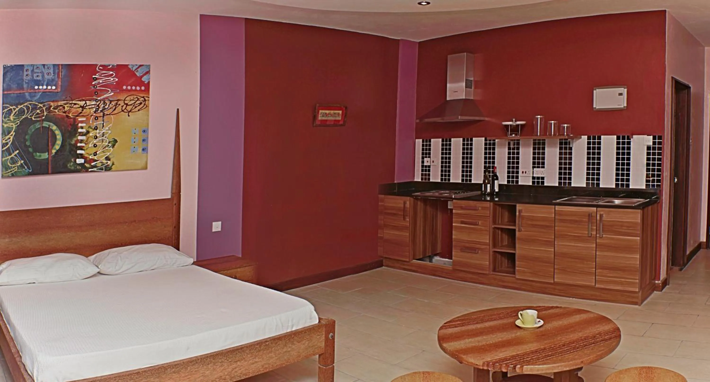 Photo of the whole room, Bed in Cowrie Shell Beach Apartments Official