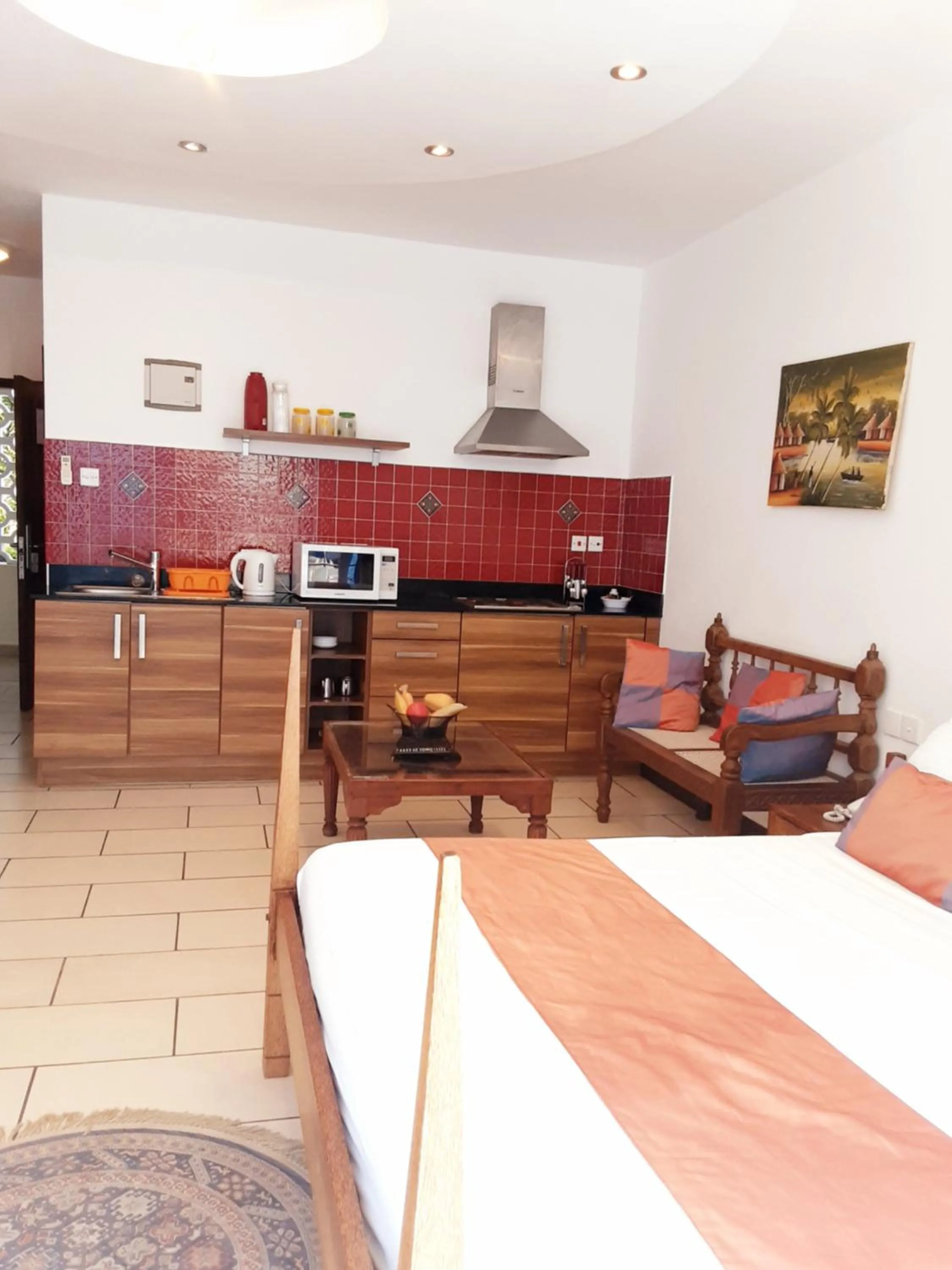 Photo of the whole room in Cowrie Shell Beach Apartments Official