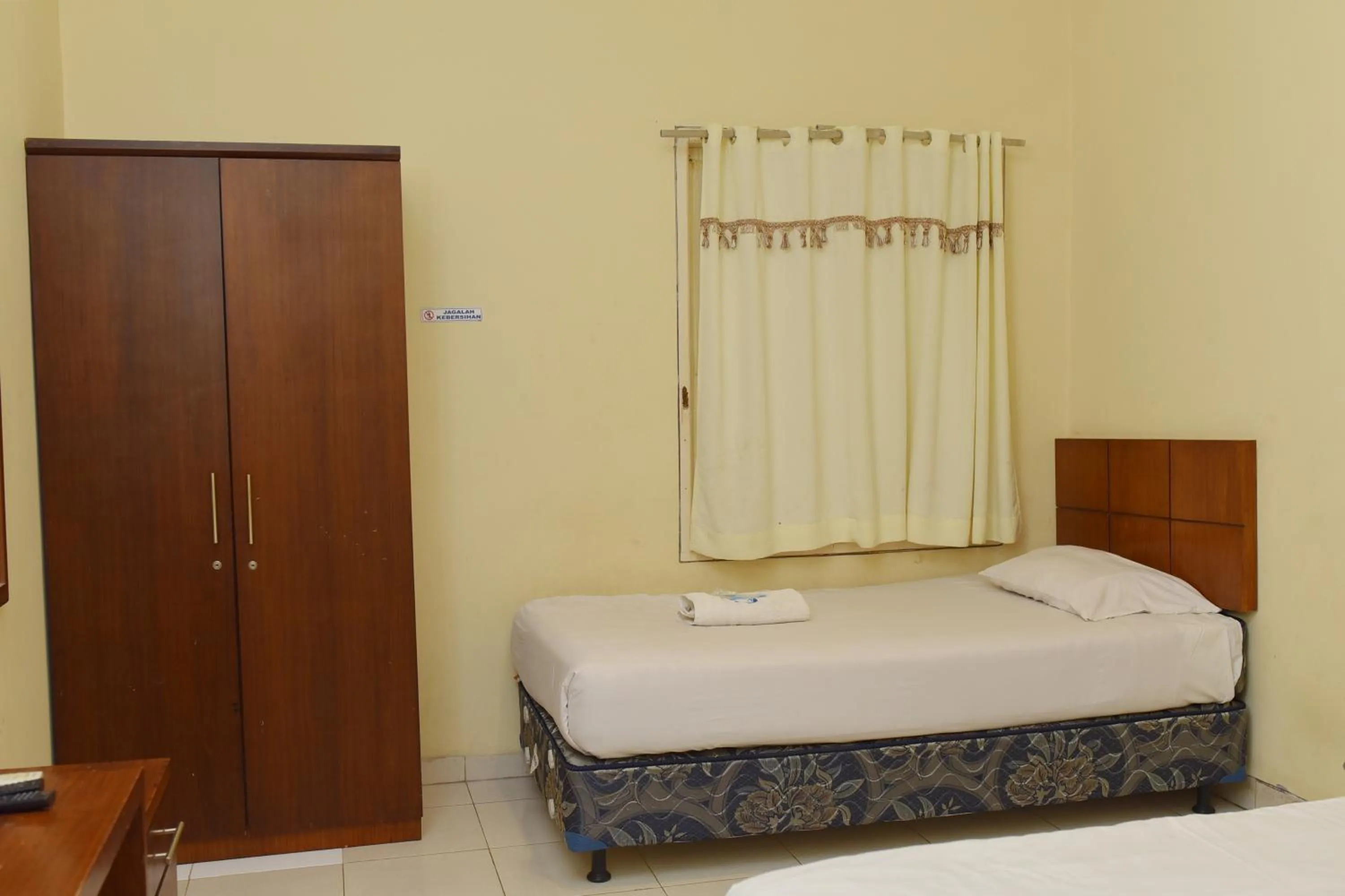 Bedroom, Bed in Al-Ghani Syariah Mitra RedDoorz