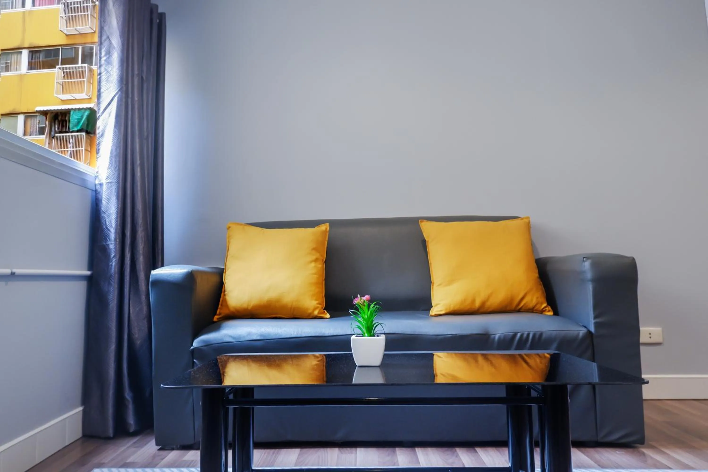 Seating area in Bangkok Impact Popular Comdominium