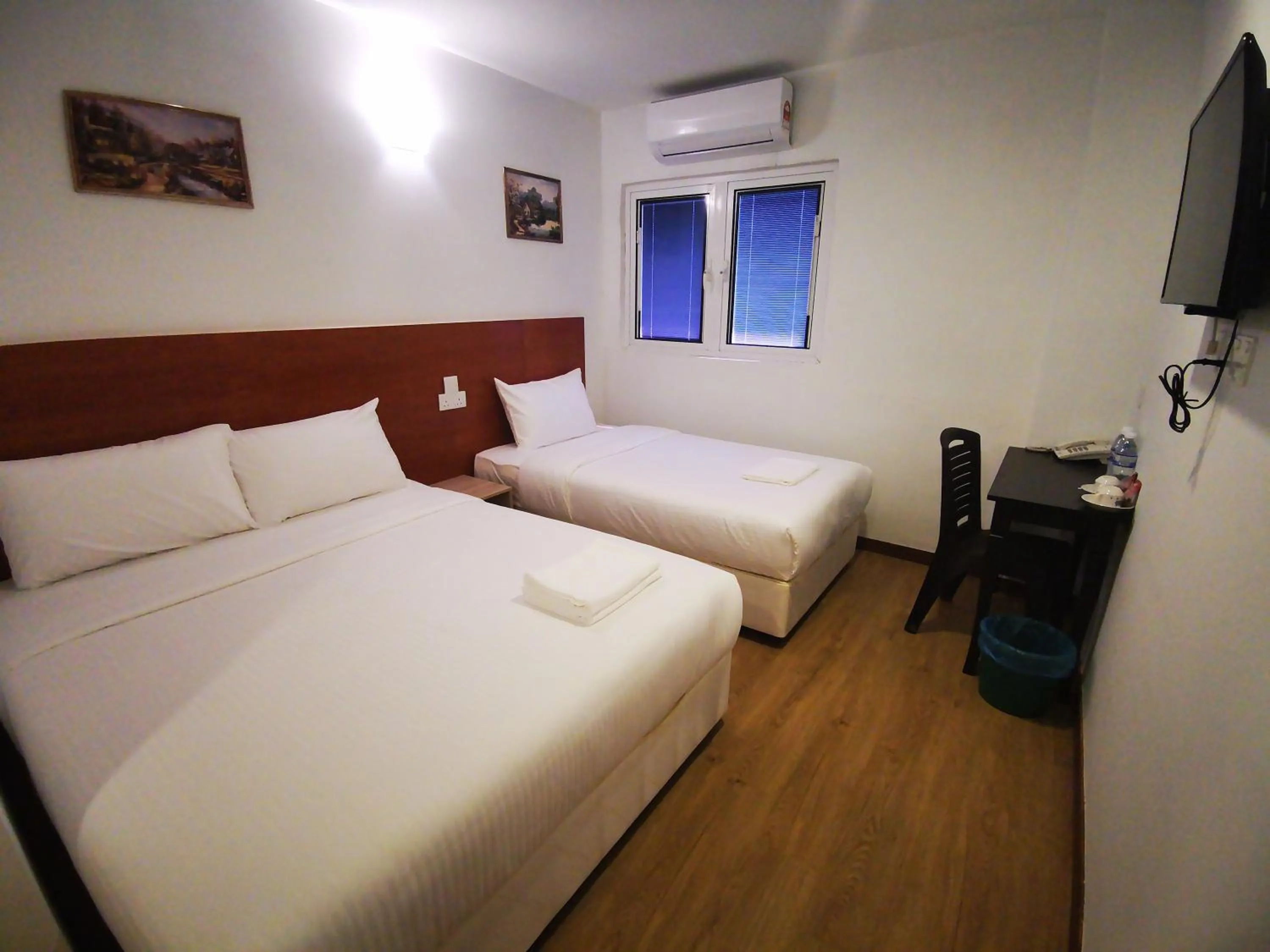 Bed in Amanjaya Hotel
