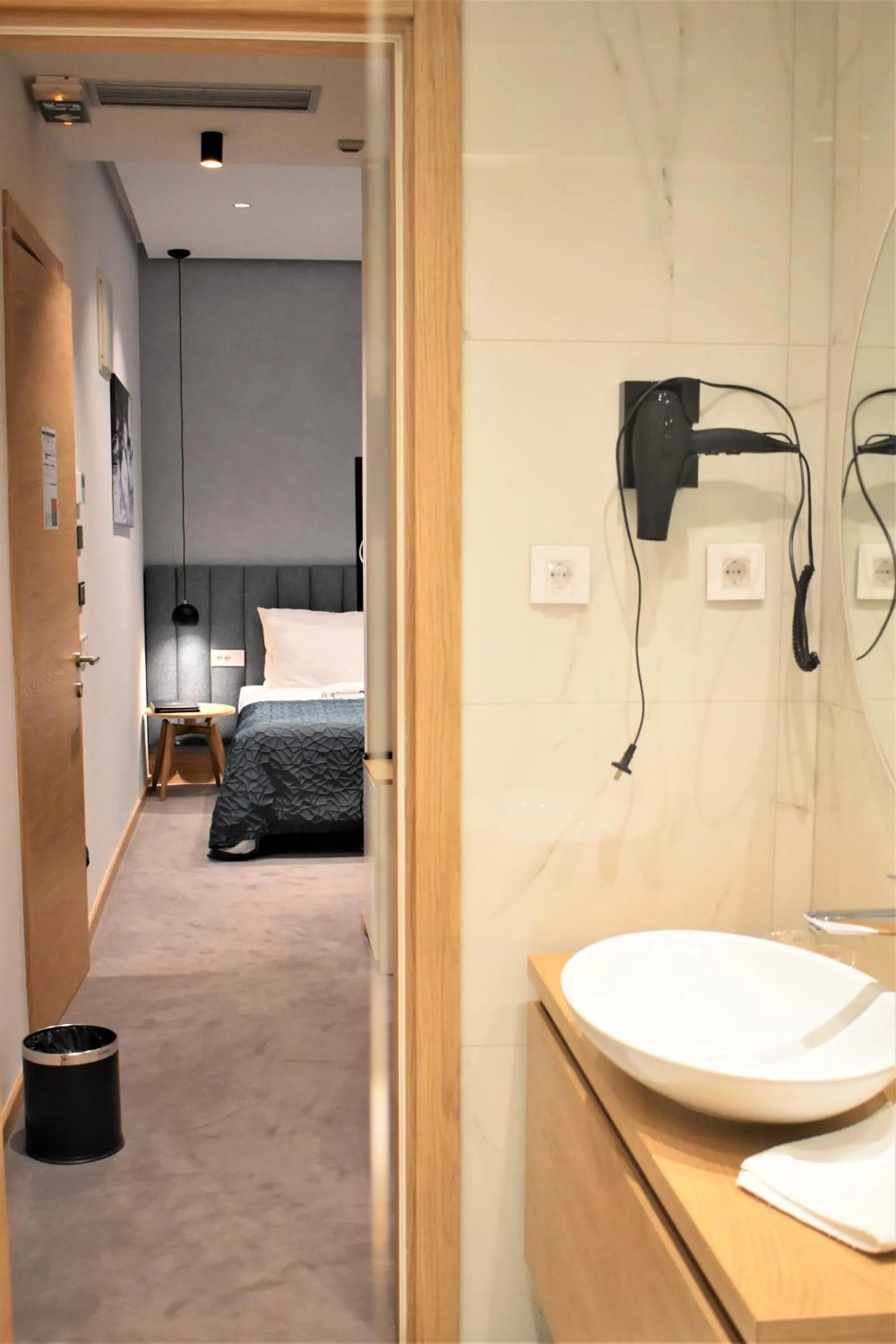 Bed in Korpa Deli Rooms