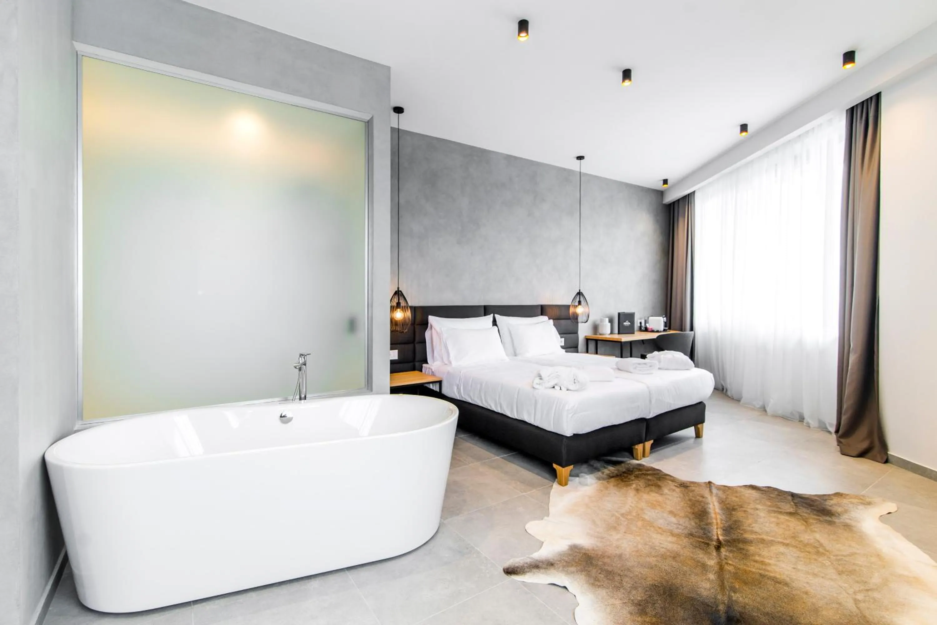 Bed in Korpa Deli Rooms