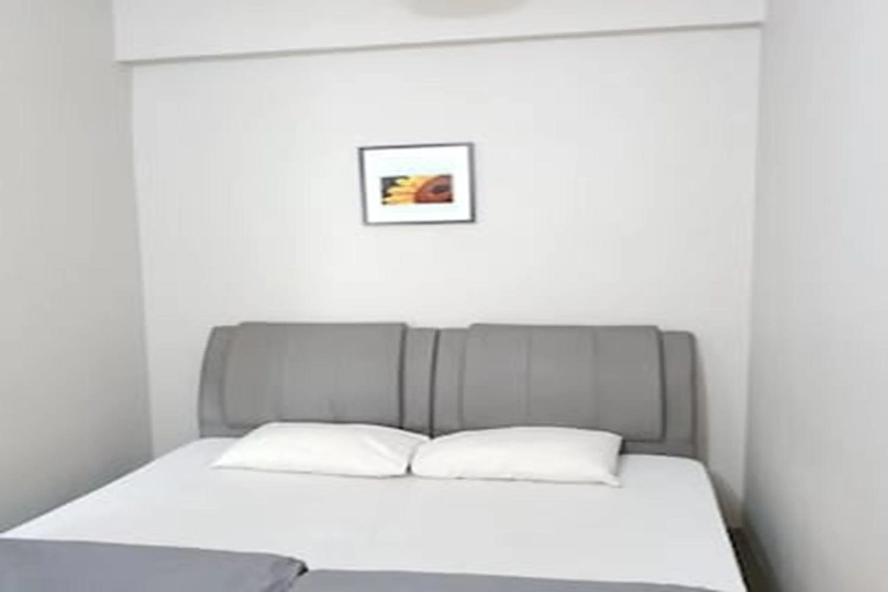 Photo of the whole room in SPOT ON 89751 Bed Station Guest House