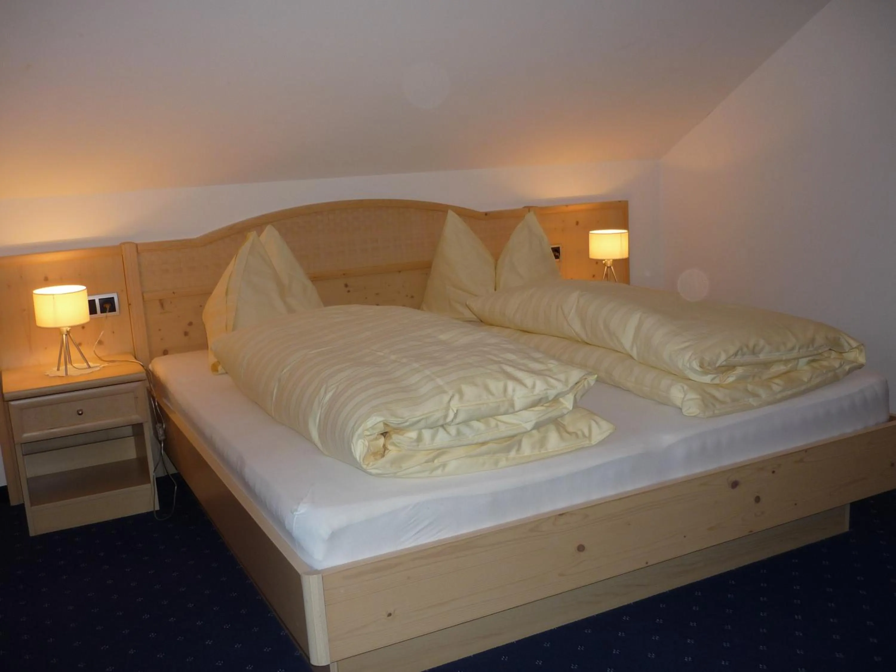 Photo of the whole room, Bed in Gasthof Obermair