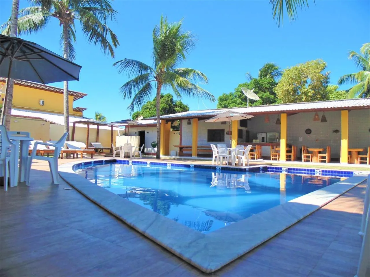 Swimming pool in Pousada Paraiso da Barra