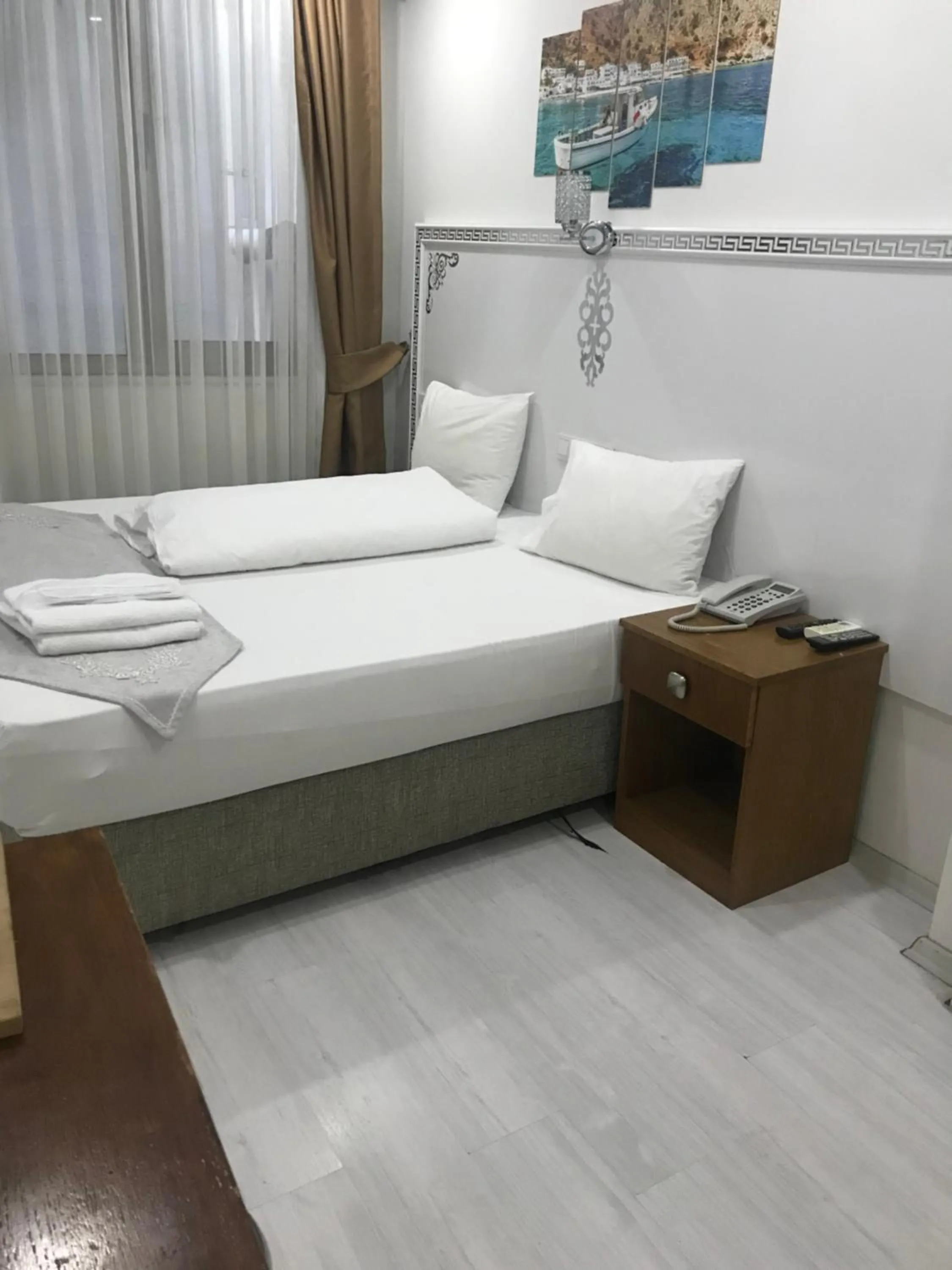 Bed in Beyhan Hotel