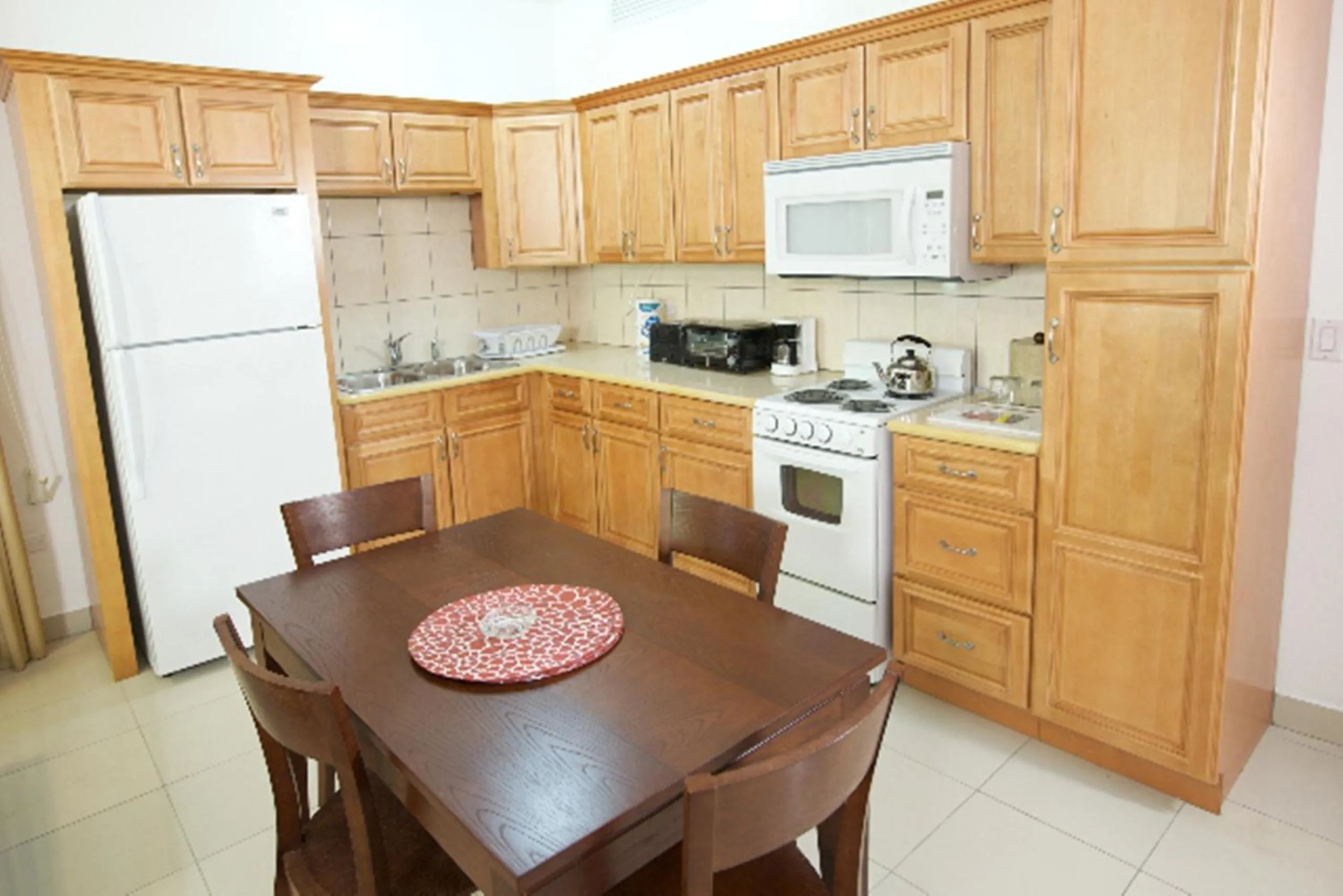 Kitchen or kitchenette in Simpson Bay Suites