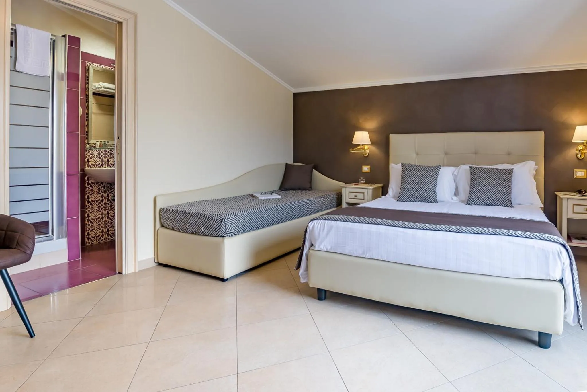 Photo of the whole room, Bed in Vittorio Emanuele Boutique Hotel