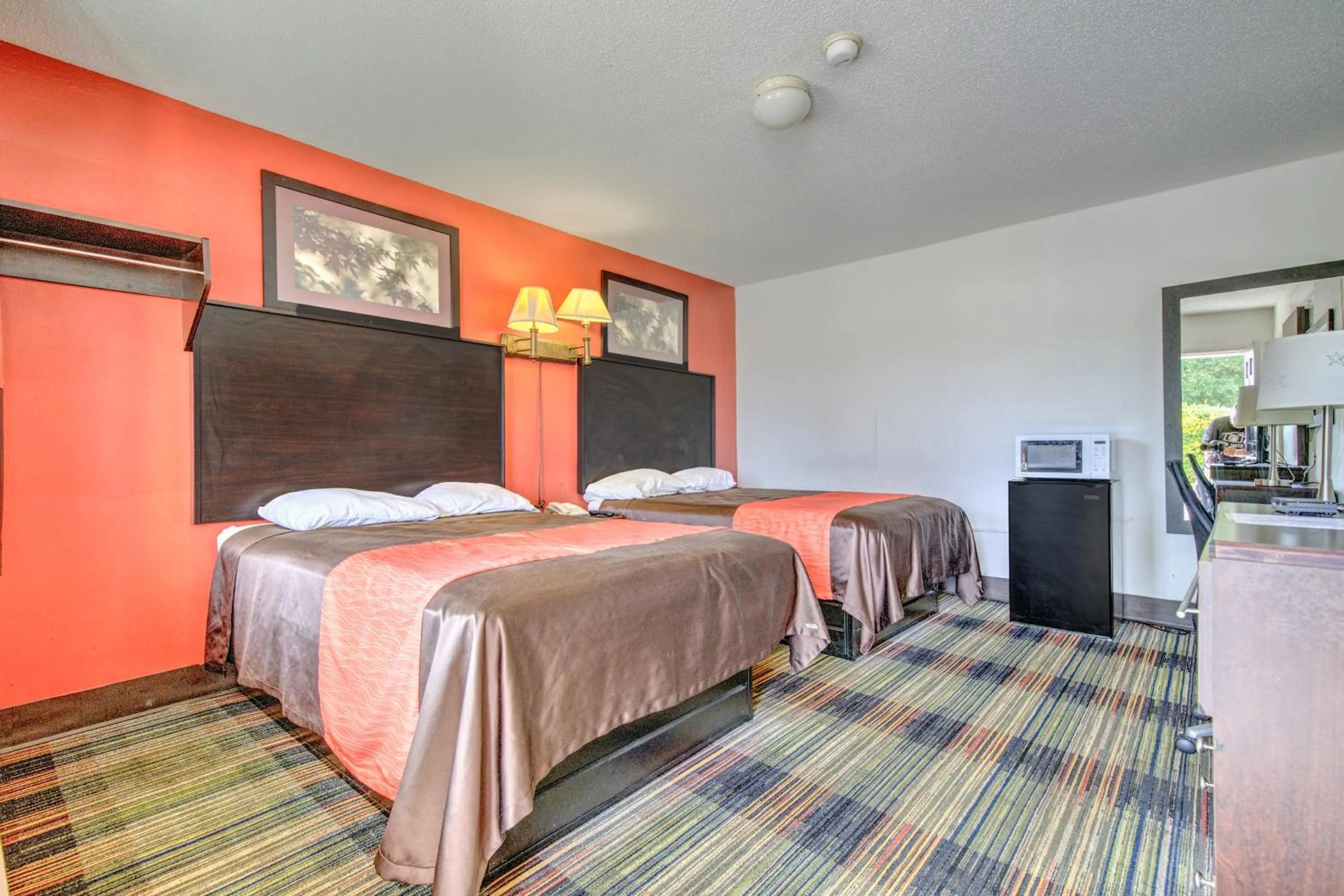 Bedroom, Bed in OYO Palm Leaf Motel