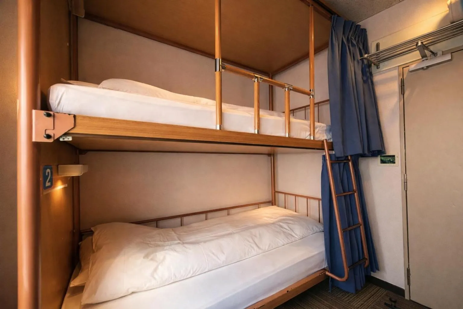 Bed in Sakura Hotel Jimbocho