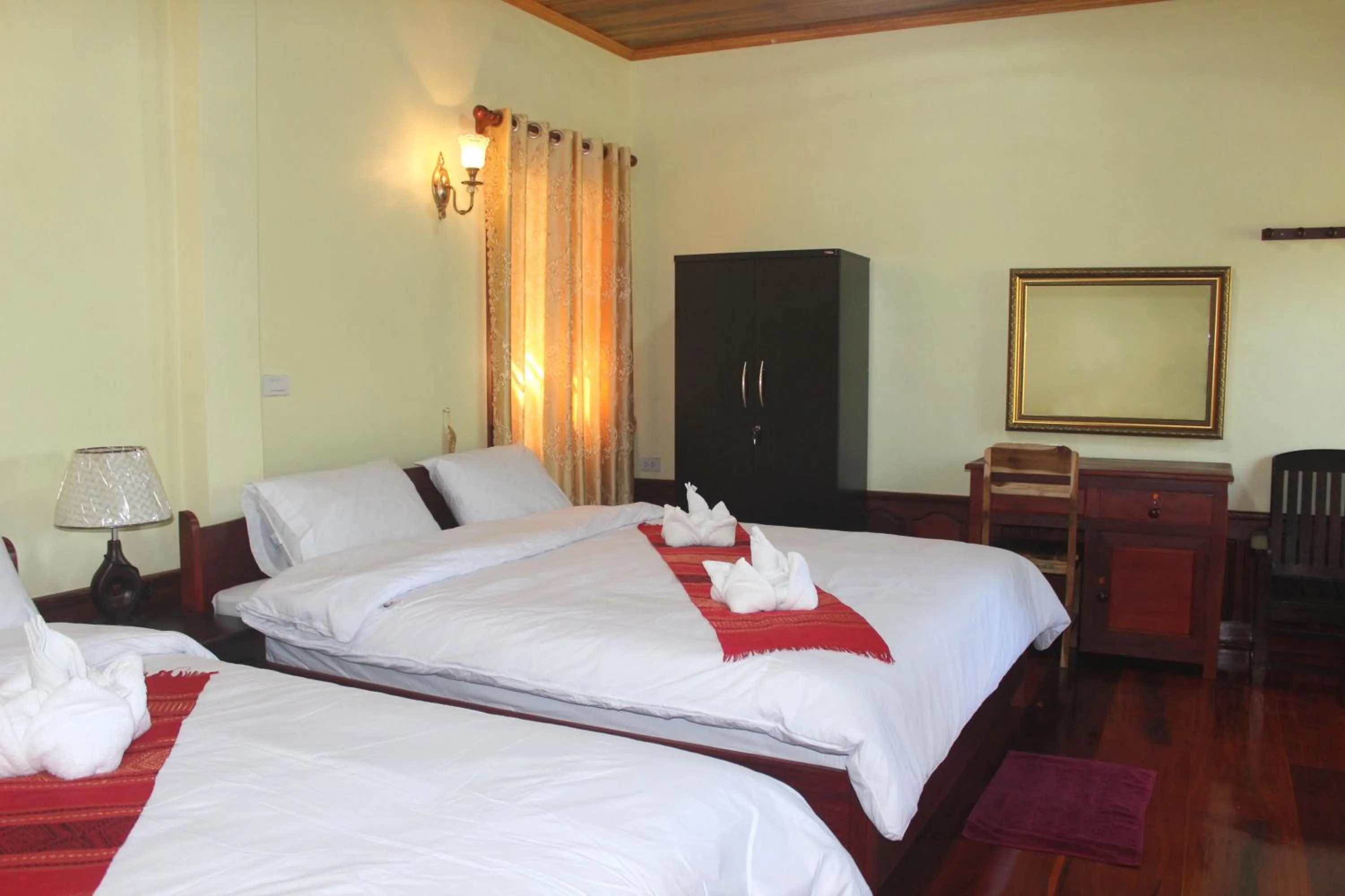 Bed in Phonepraseuth Guesthouse