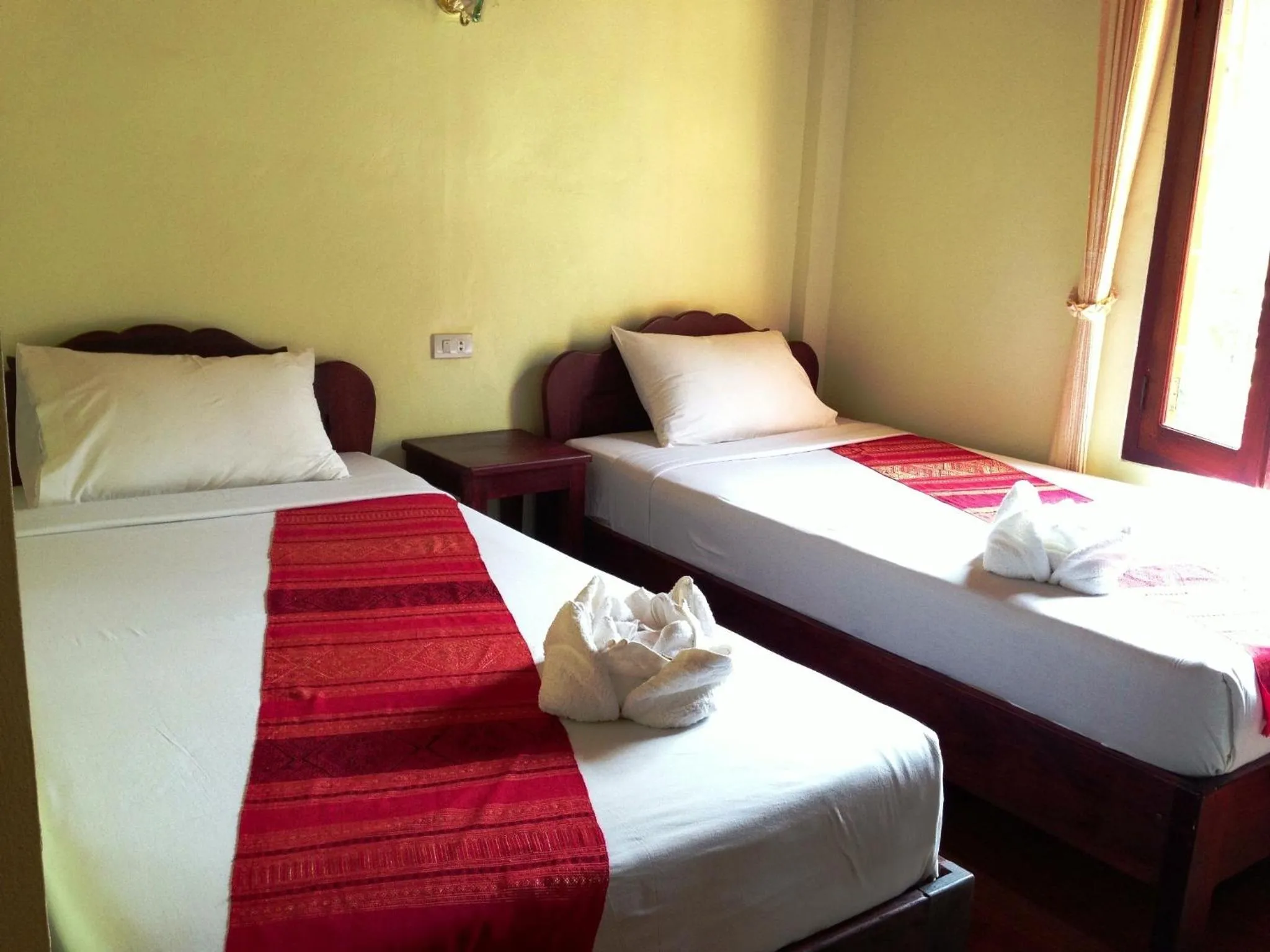 Bed in Phonepraseuth Guesthouse