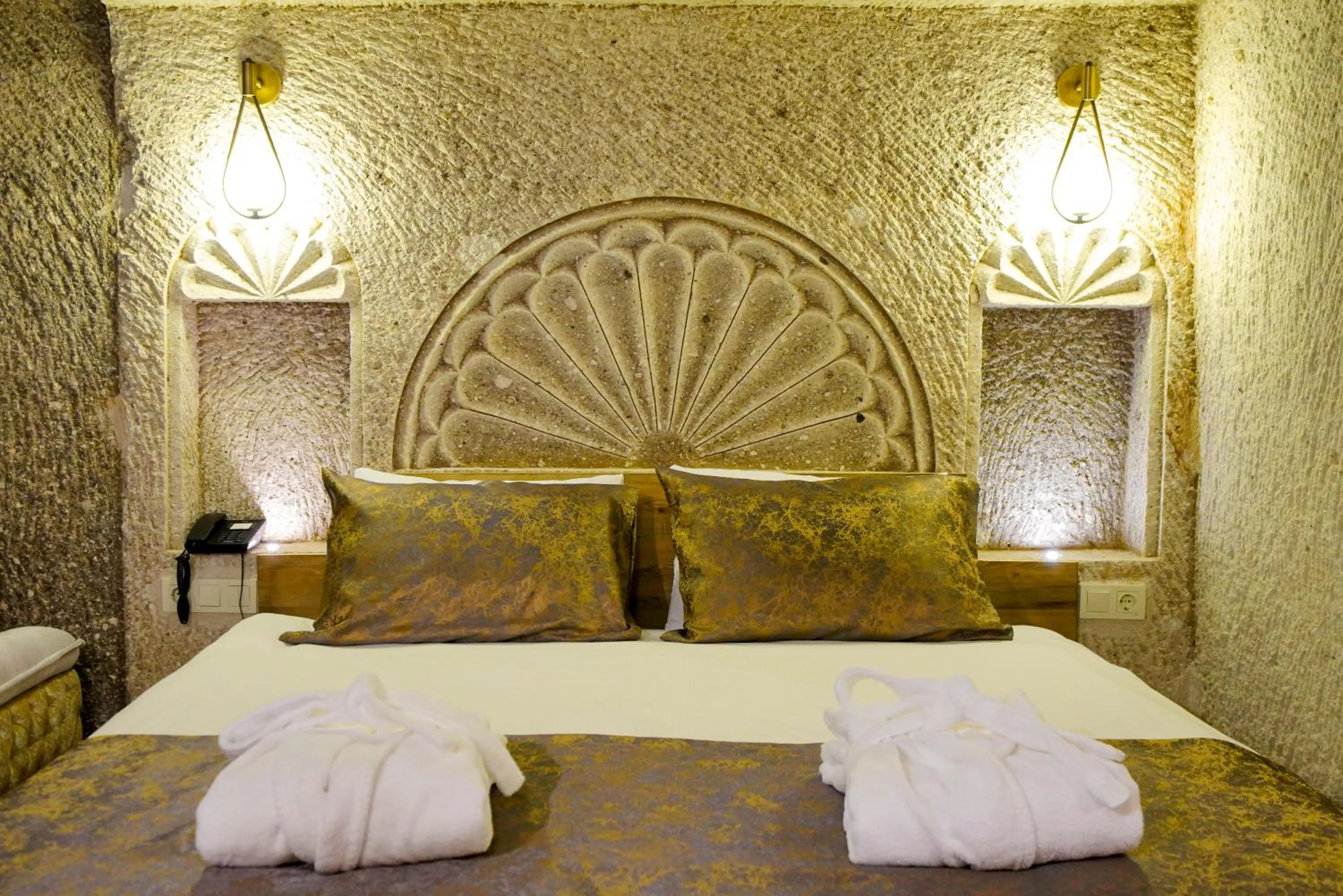 Bed in Cave Hotel Saksagan